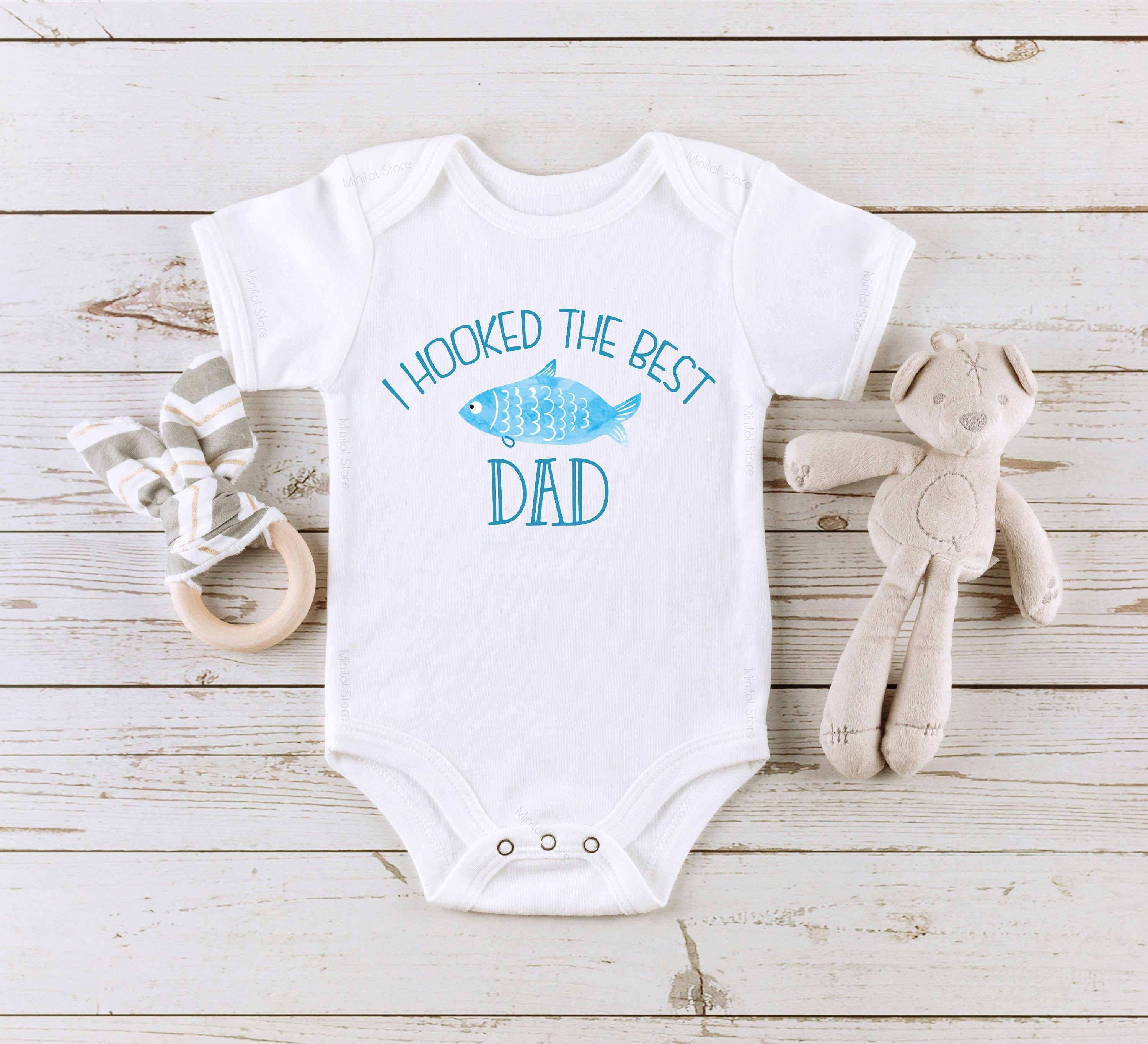 I Hooked The Best Dad Onesie® Fishing Bodysuit, Fishing Newborn Outfit, Baby Shower Gift, Baby Onesie® Baby Boy Onesie® Fish Bodysuit