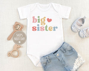 Big Sister typographic design on Baby Short Sleeve Onesie®
