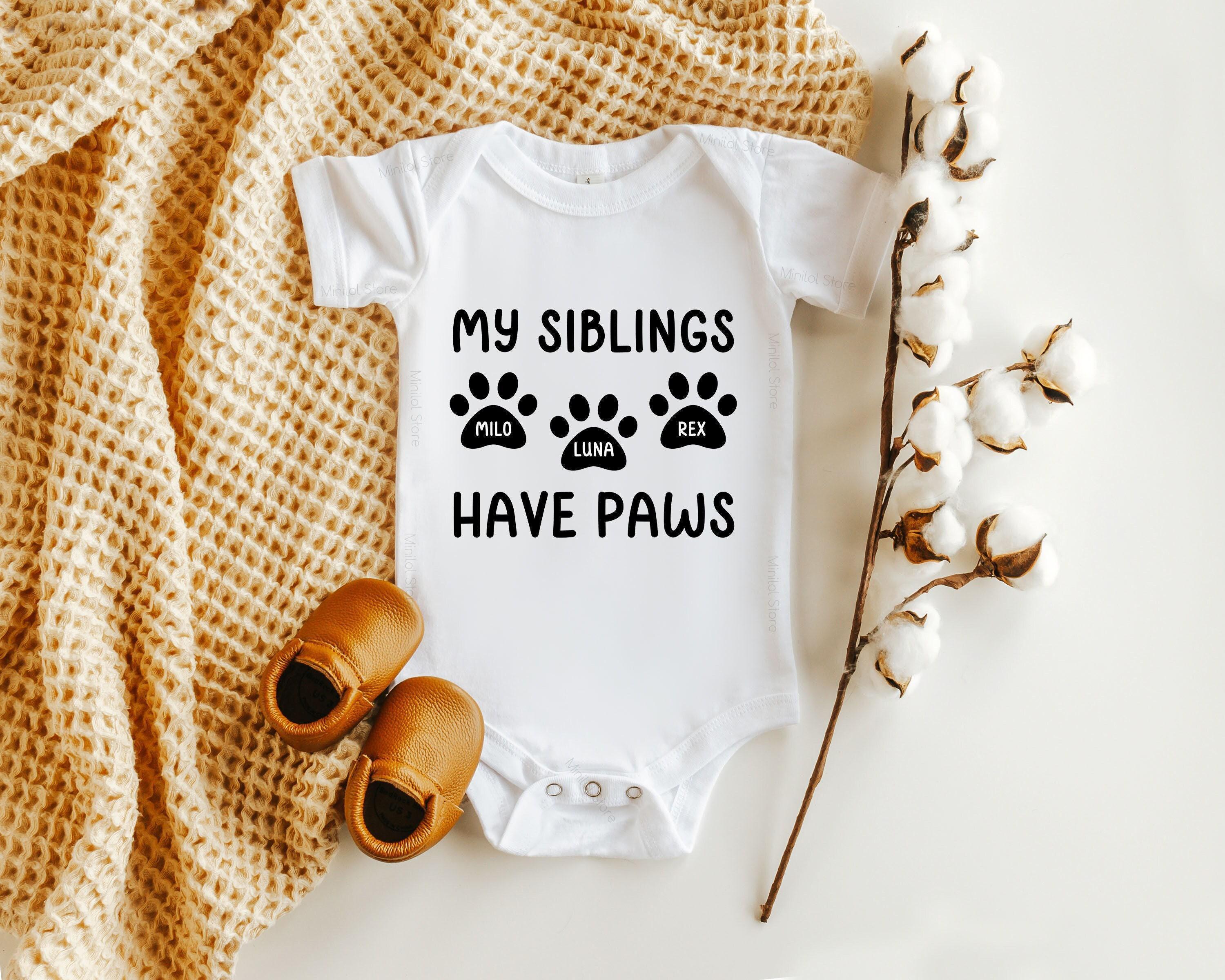 Main pregnancy announcement product mockup for My Siblings Have Paws Pregnancy Announcement Sibling Reveal Shirt
