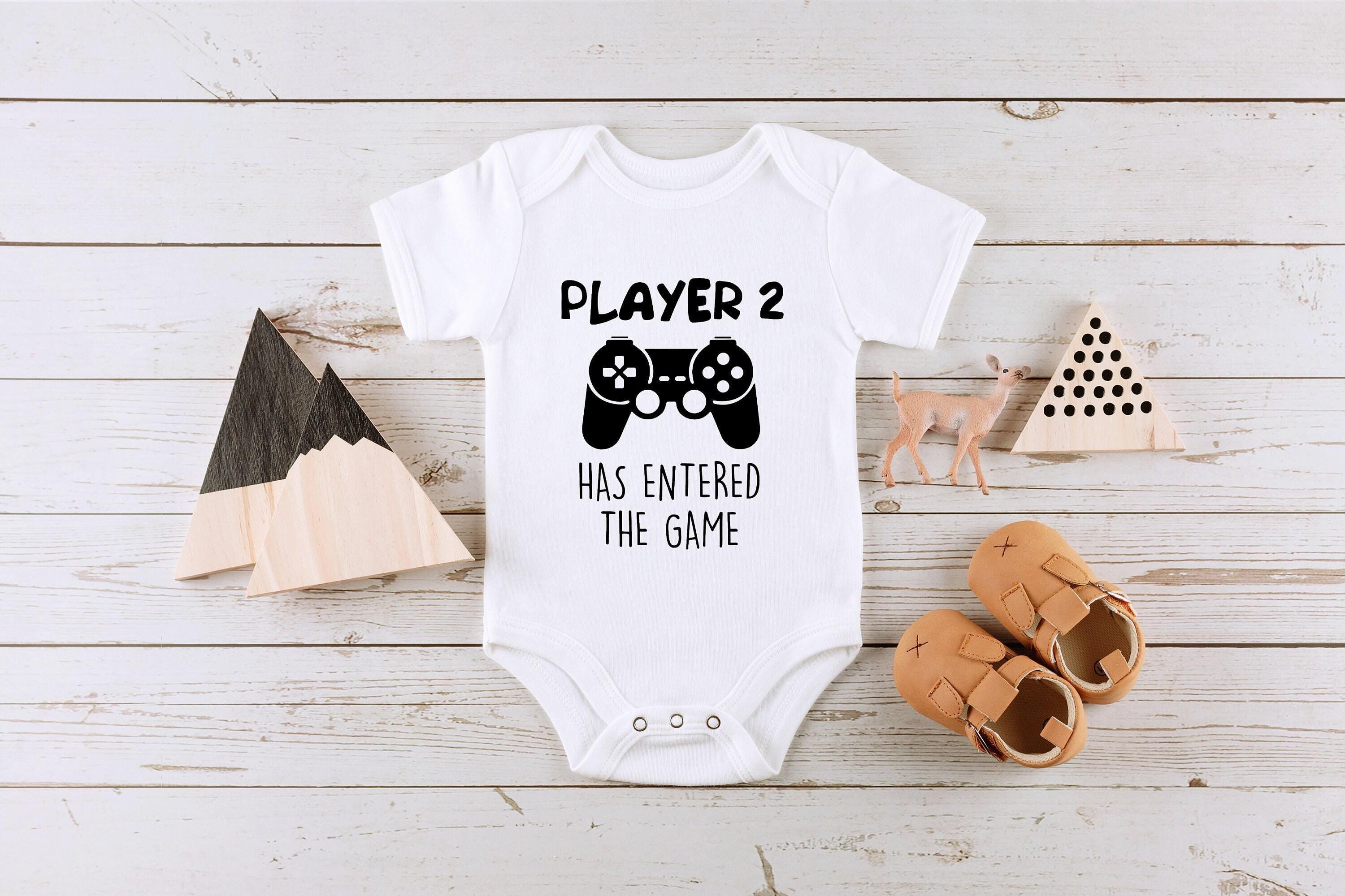 Close-up of the Player 2 Has Entered the Game baby announcement design