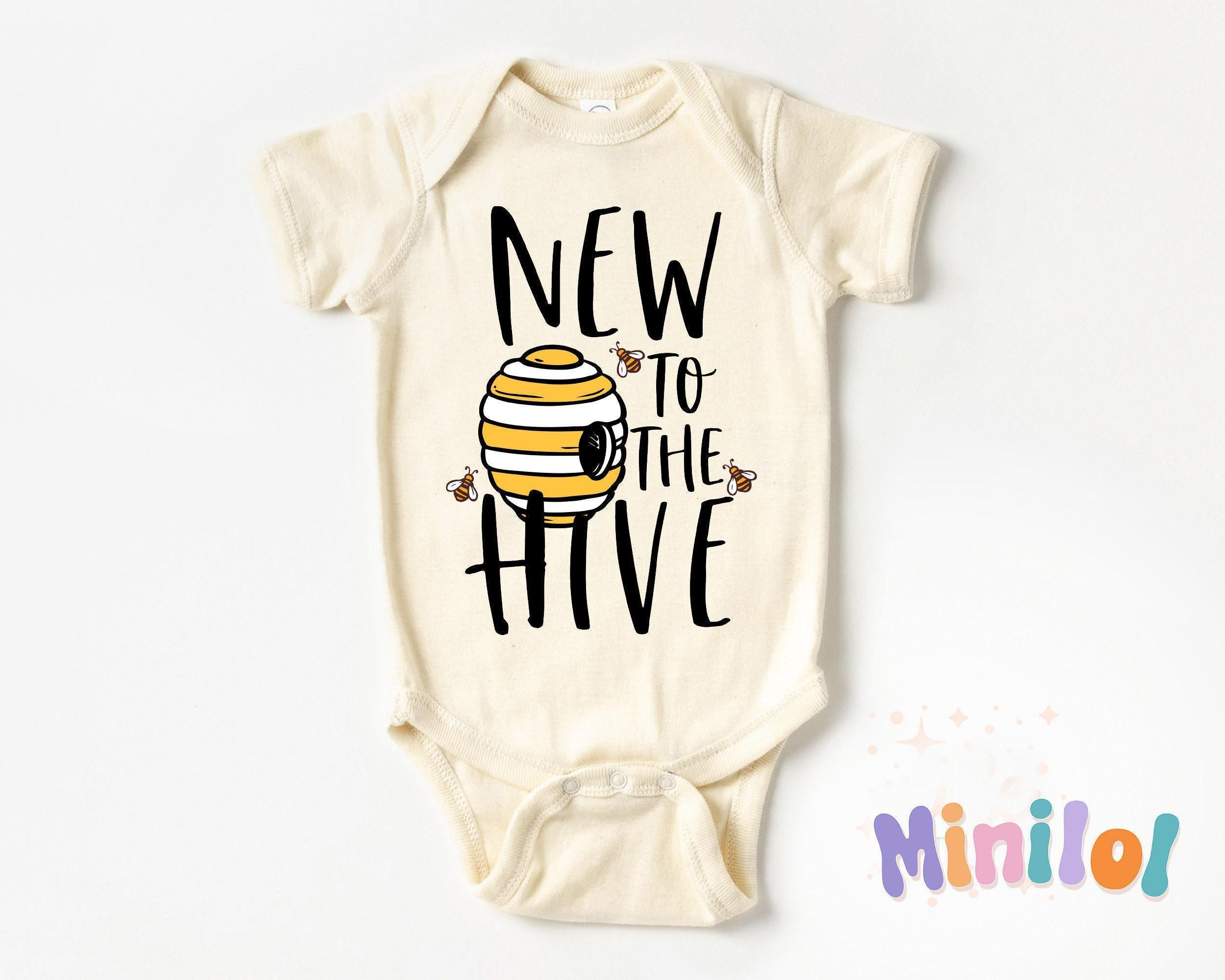 Main pregnancy announcement product mockup for New to the Hive Pregnancy Announcement Baby Announcement Onesie® – Style 2