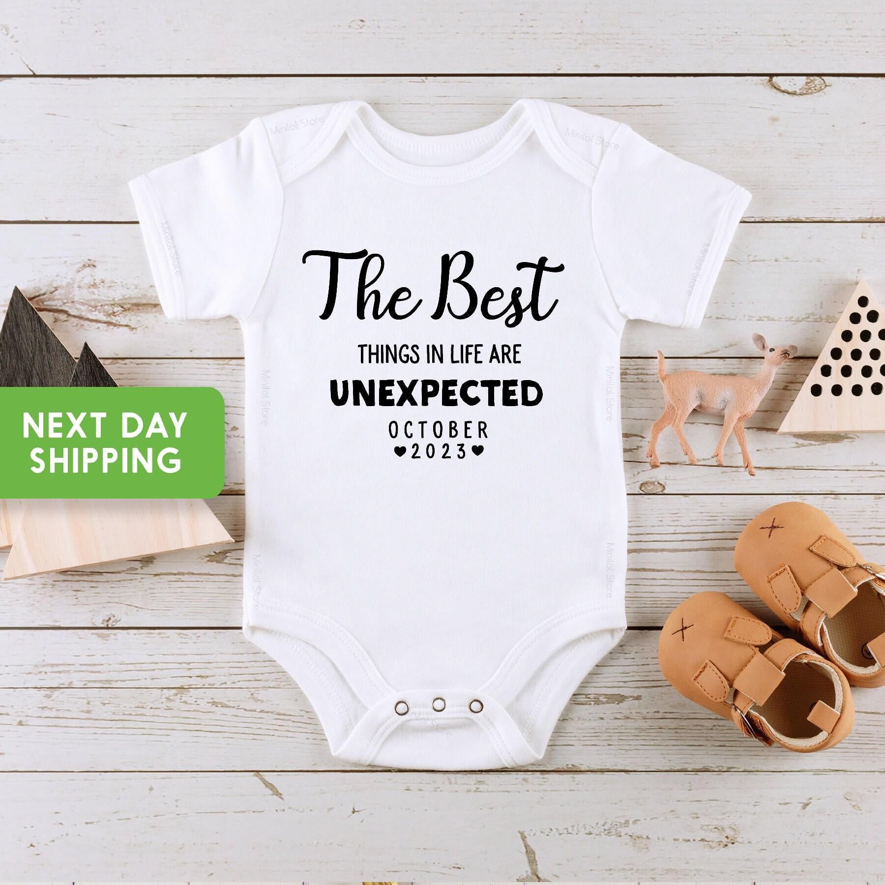 Close-up of the The Best Things in Life Are Unexpected baby announcement design