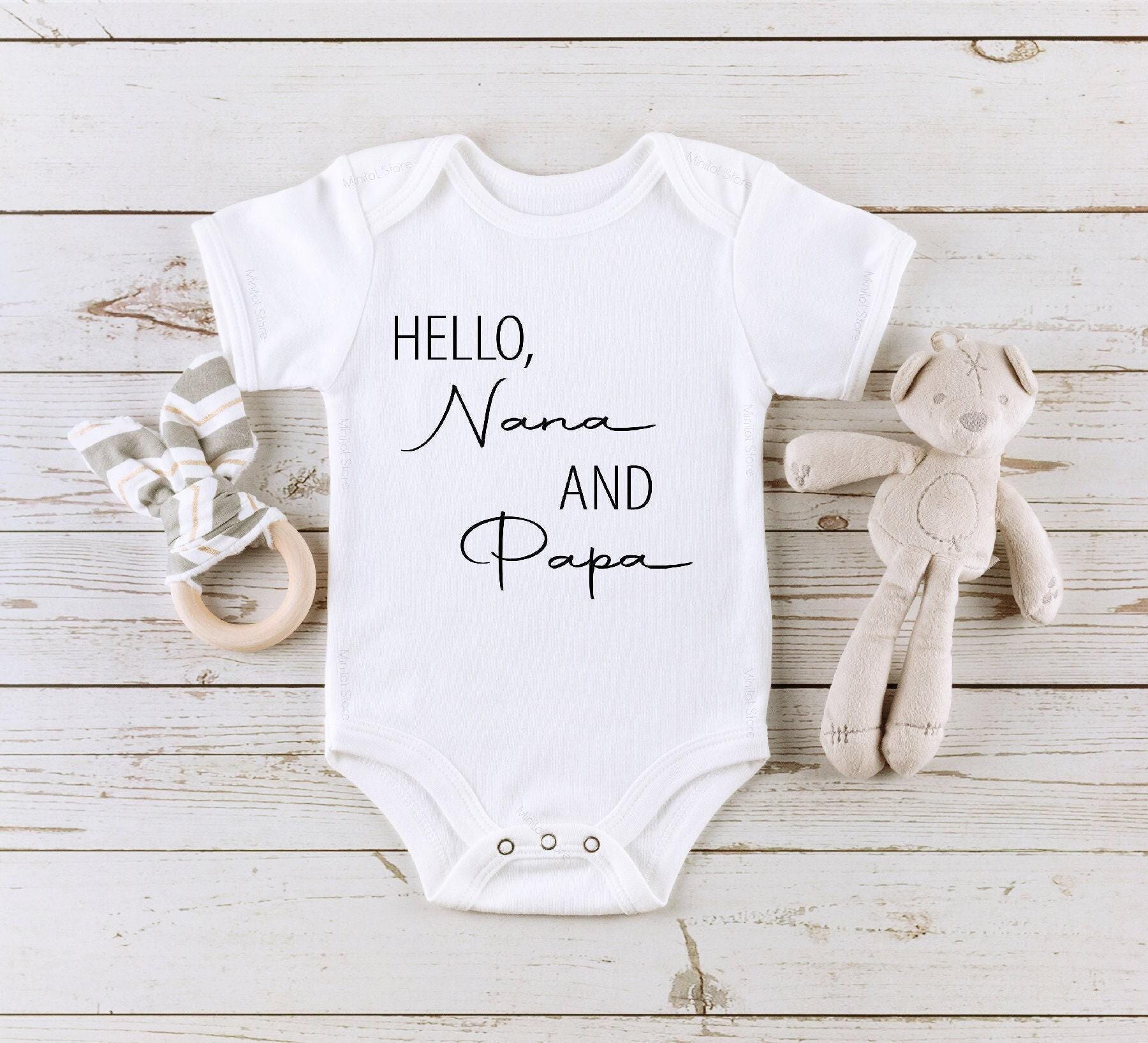 Main pregnancy announcement product mockup for Hello Nana and Papa Grandparent Pregnancy Reveal Baby Announcement Onesie®