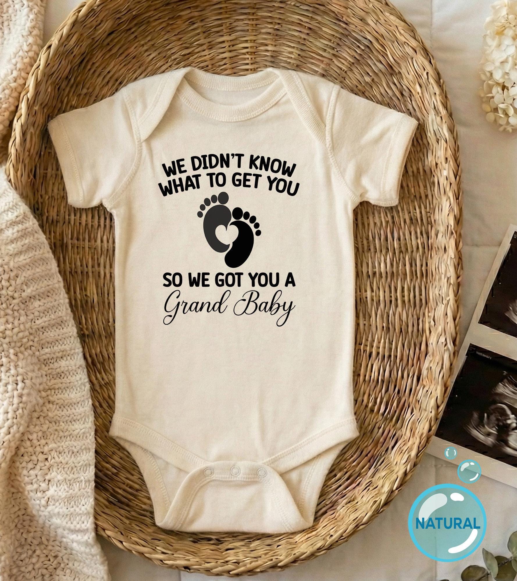 Close-up of the We Didn't Know What To Get You So We Got You A Grand ® baby announcement design