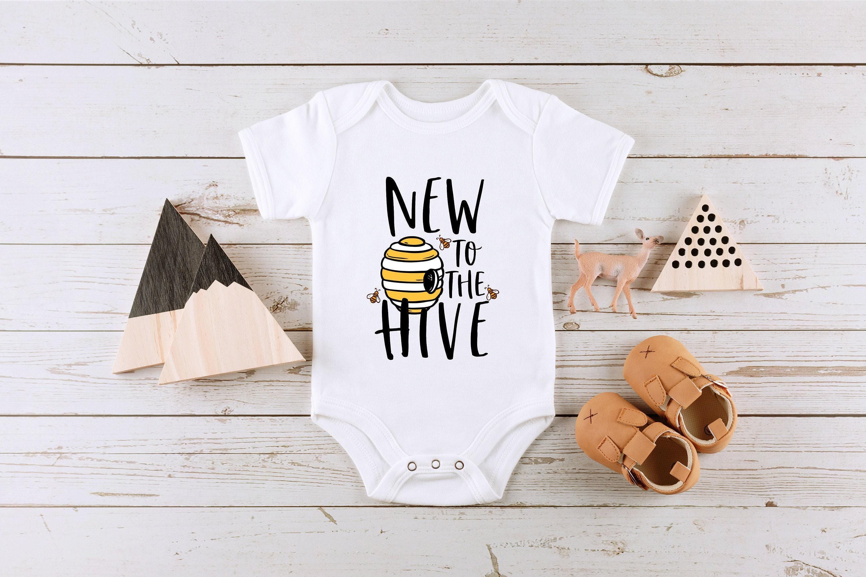 Close-up of the New to the Hive baby announcement design