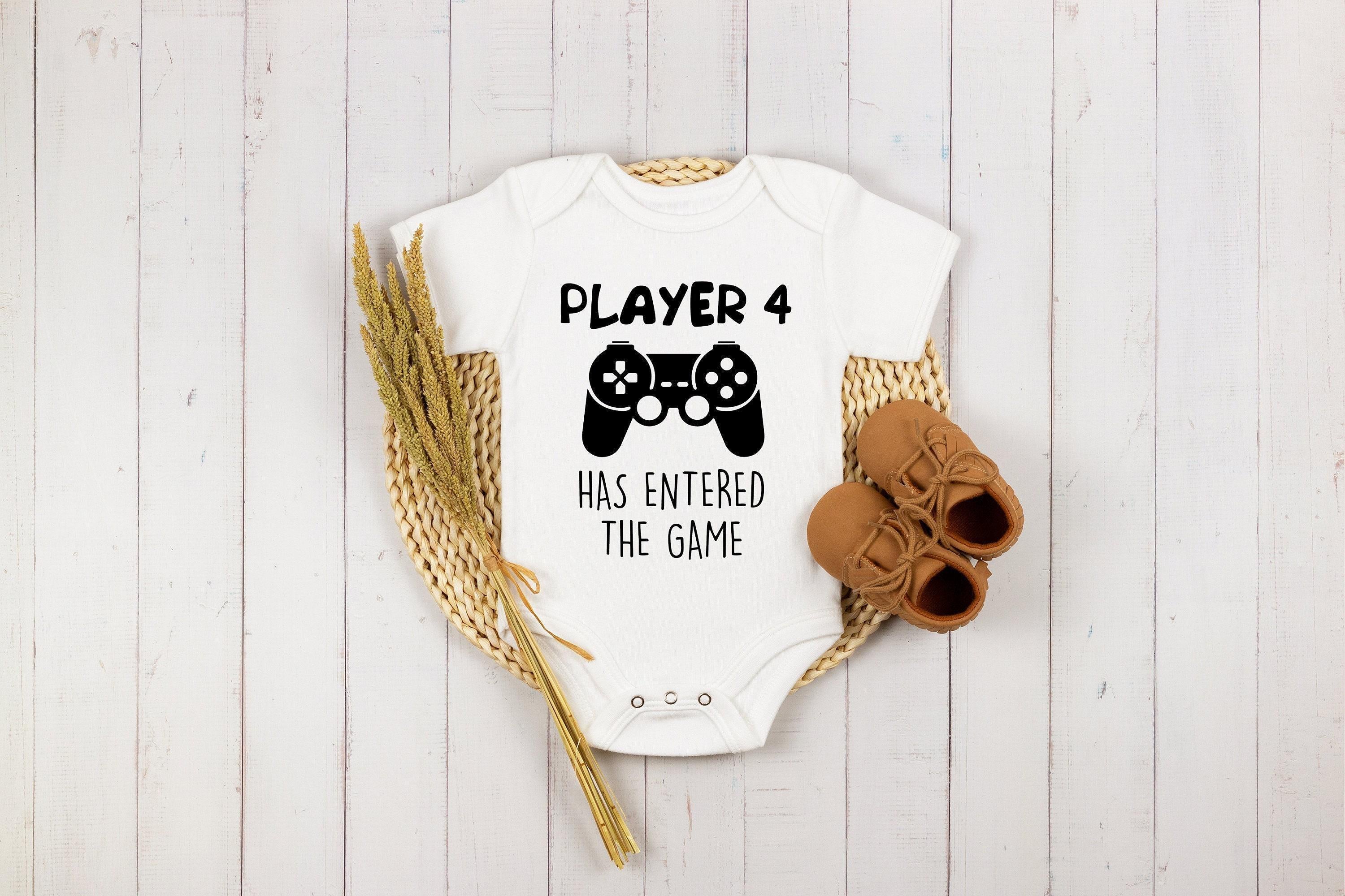Close-up of the Player 4 Has Entered the Game baby announcement design