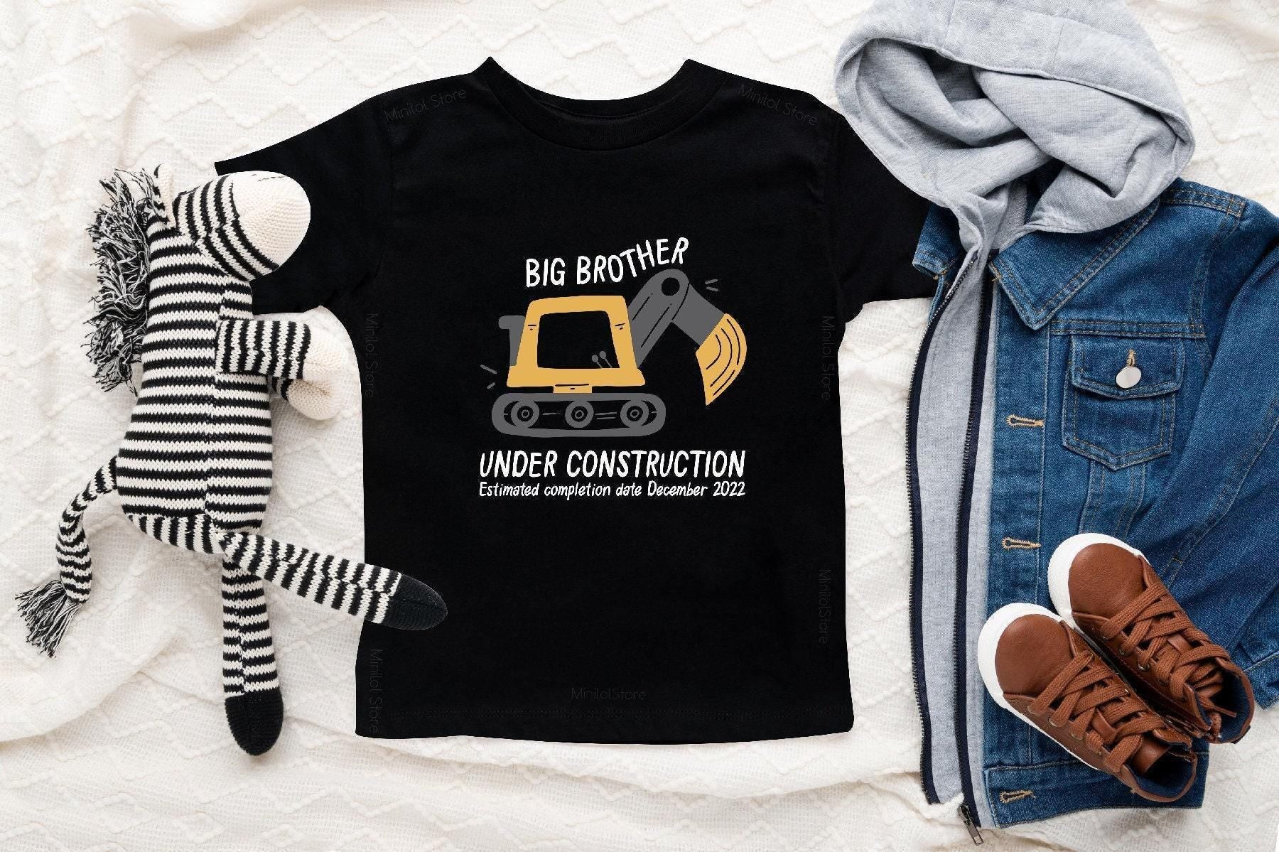 Main pregnancy announcement product mockup for Big Brother Under Construction Pregnancy Announcement Sibling Reveal Shirt –
