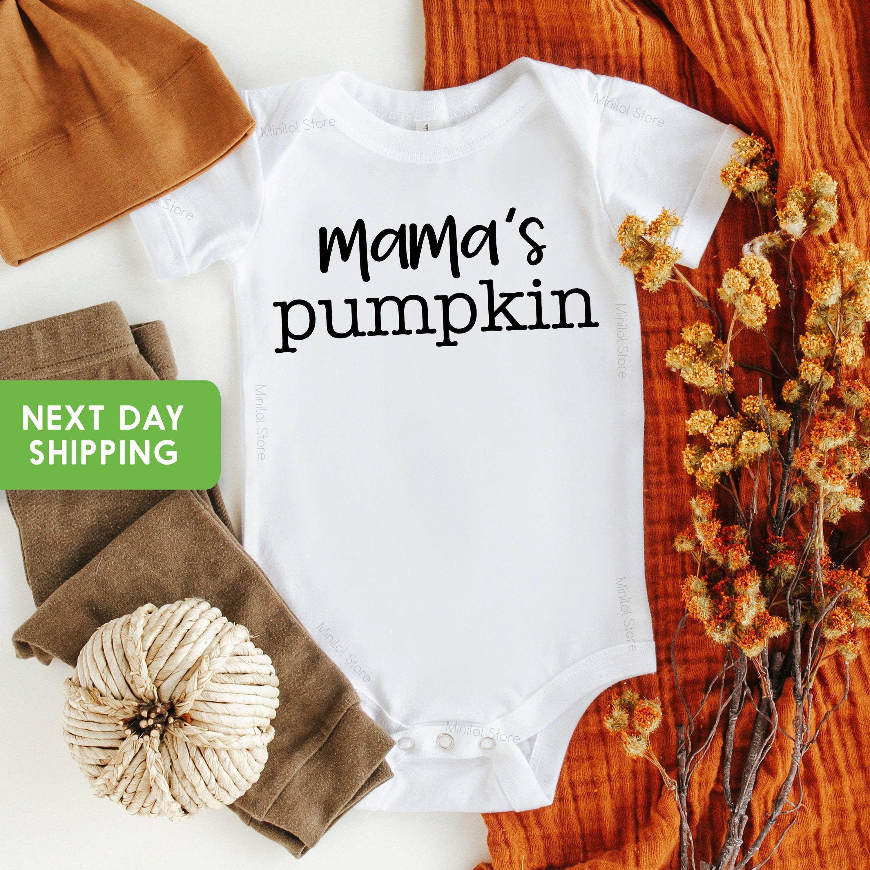 Main product mockup of Mama's Pumpkin Fall Baby Onesie®