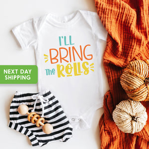 Main product mockup of I'll Bring the Rolls First Thanksgiving Baby Onesie®