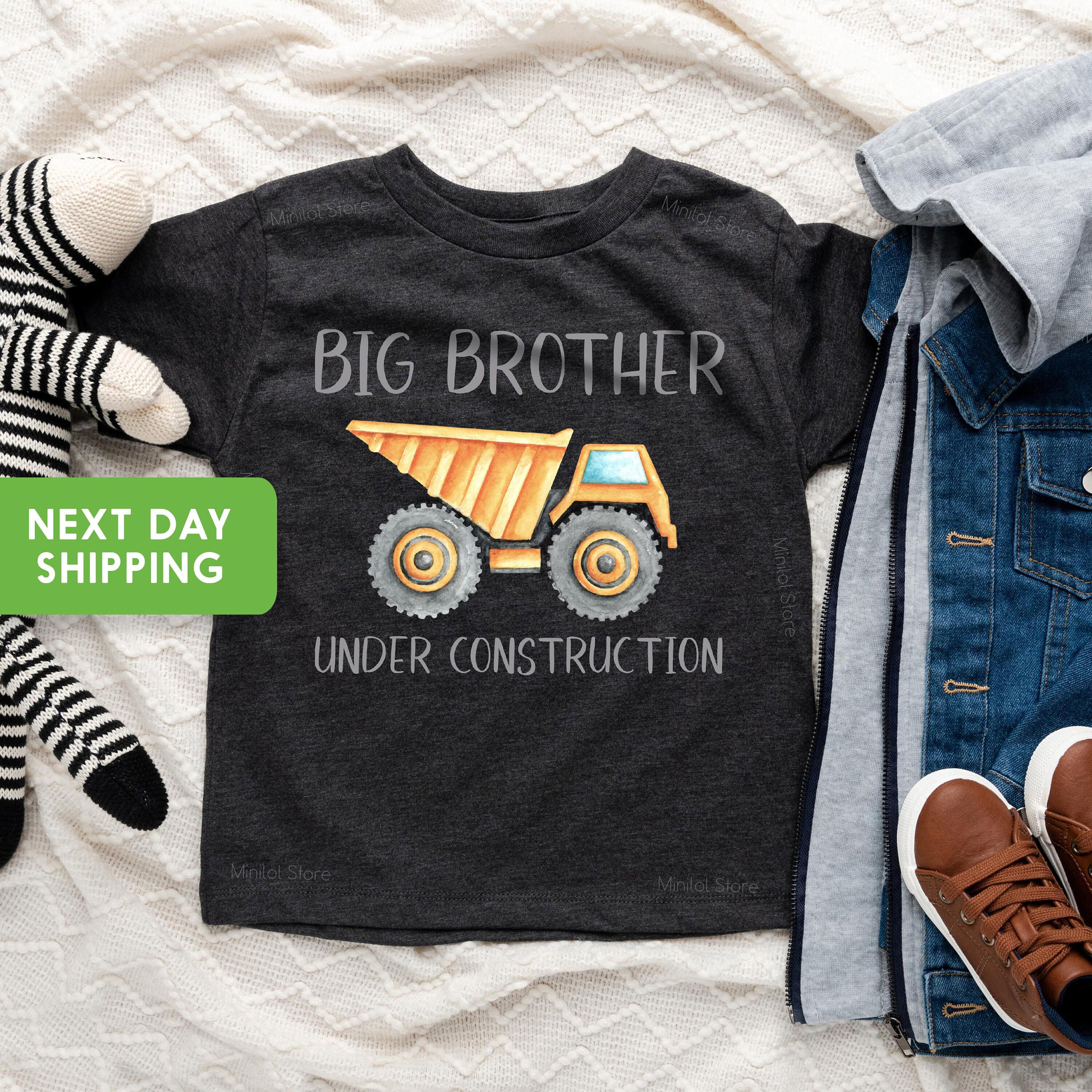 Main pregnancy announcement product mockup for Big Brother Under Construction Pregnancy Announcement Sibling Reveal Shirt