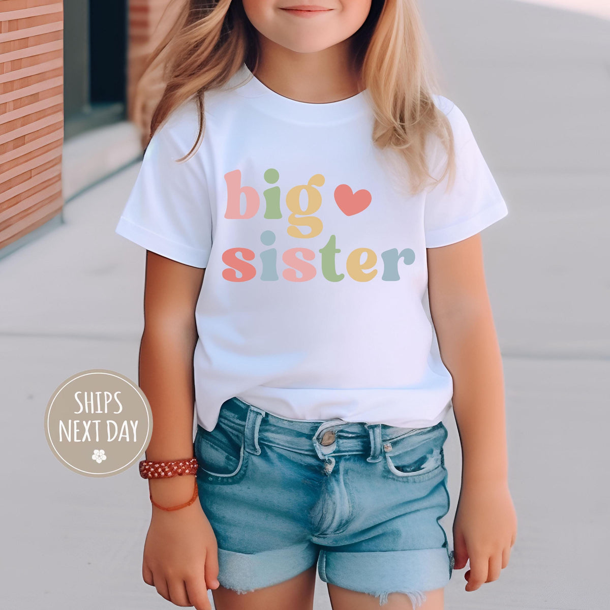 Big Sister typographic design on Baby Short Sleeve Onesie®