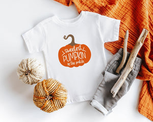 Lifestyle mockup featuring Sweetest Pumpkin Fall Baby Onesie®
