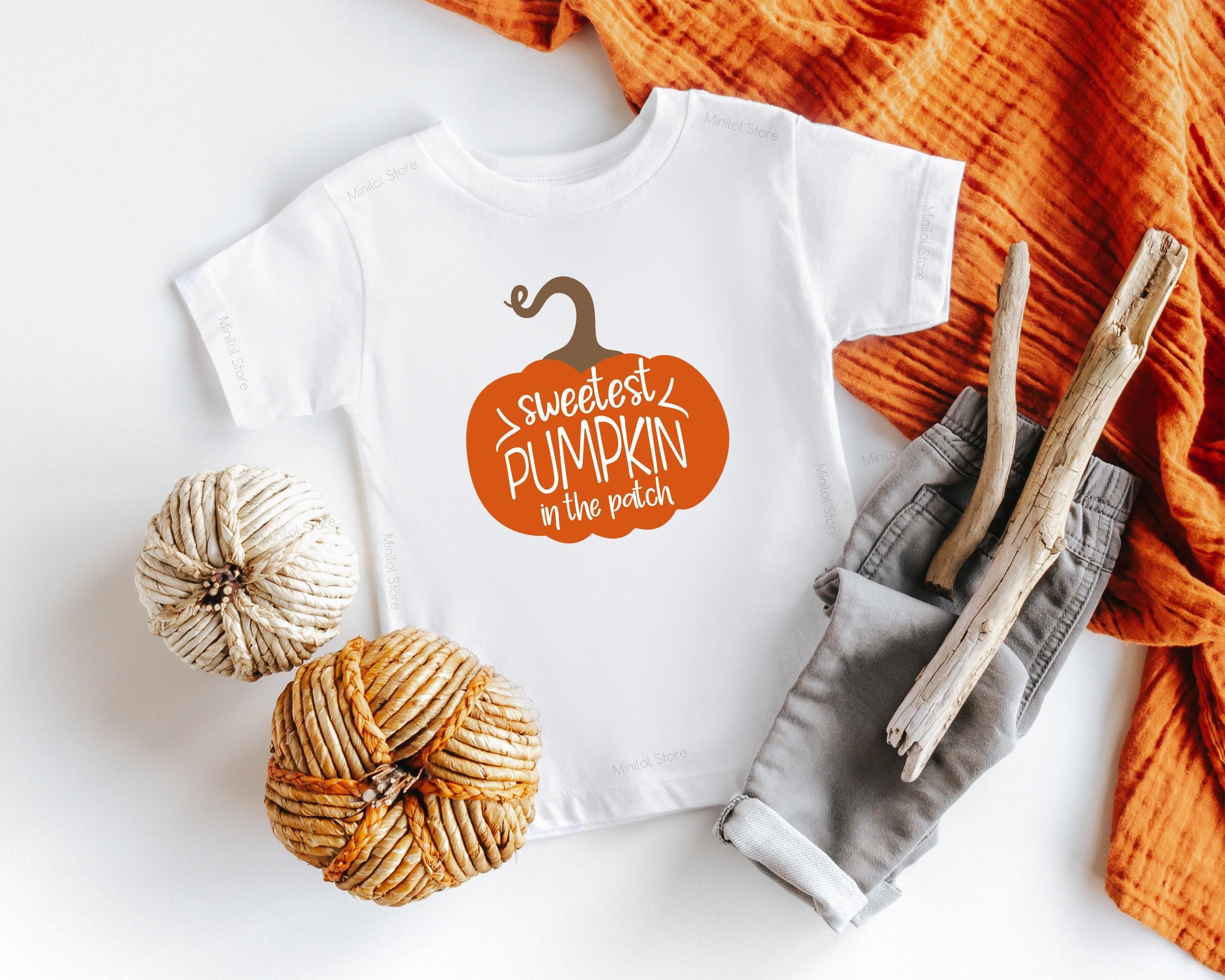 Lifestyle mockup featuring Sweetest Pumpkin Fall Baby Onesie®
