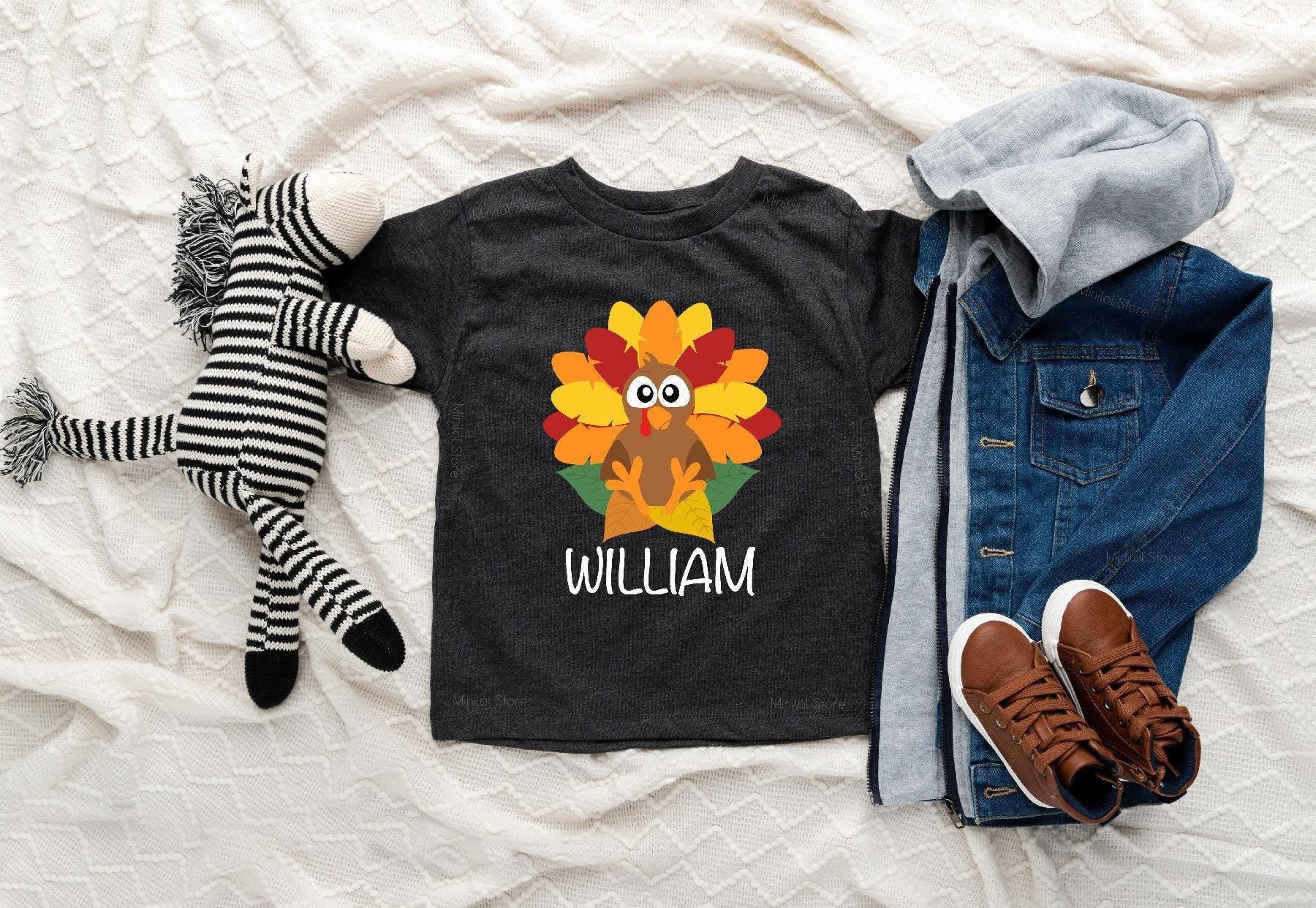 Lifestyle mockup featuring Personalized Turkey Thanksgiving Baby Onesie®