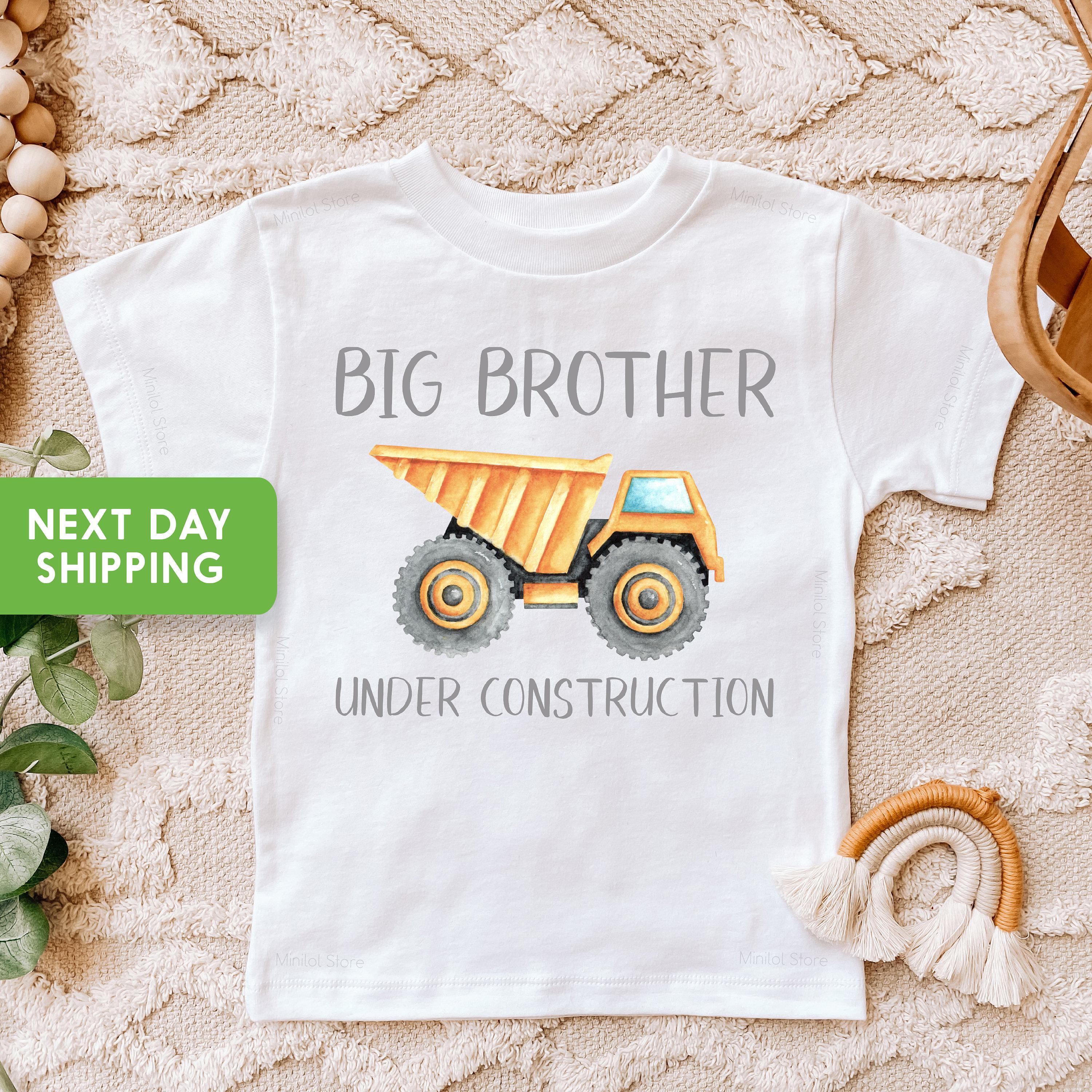 Close-up of the Big Brother Under Construction baby announcement design