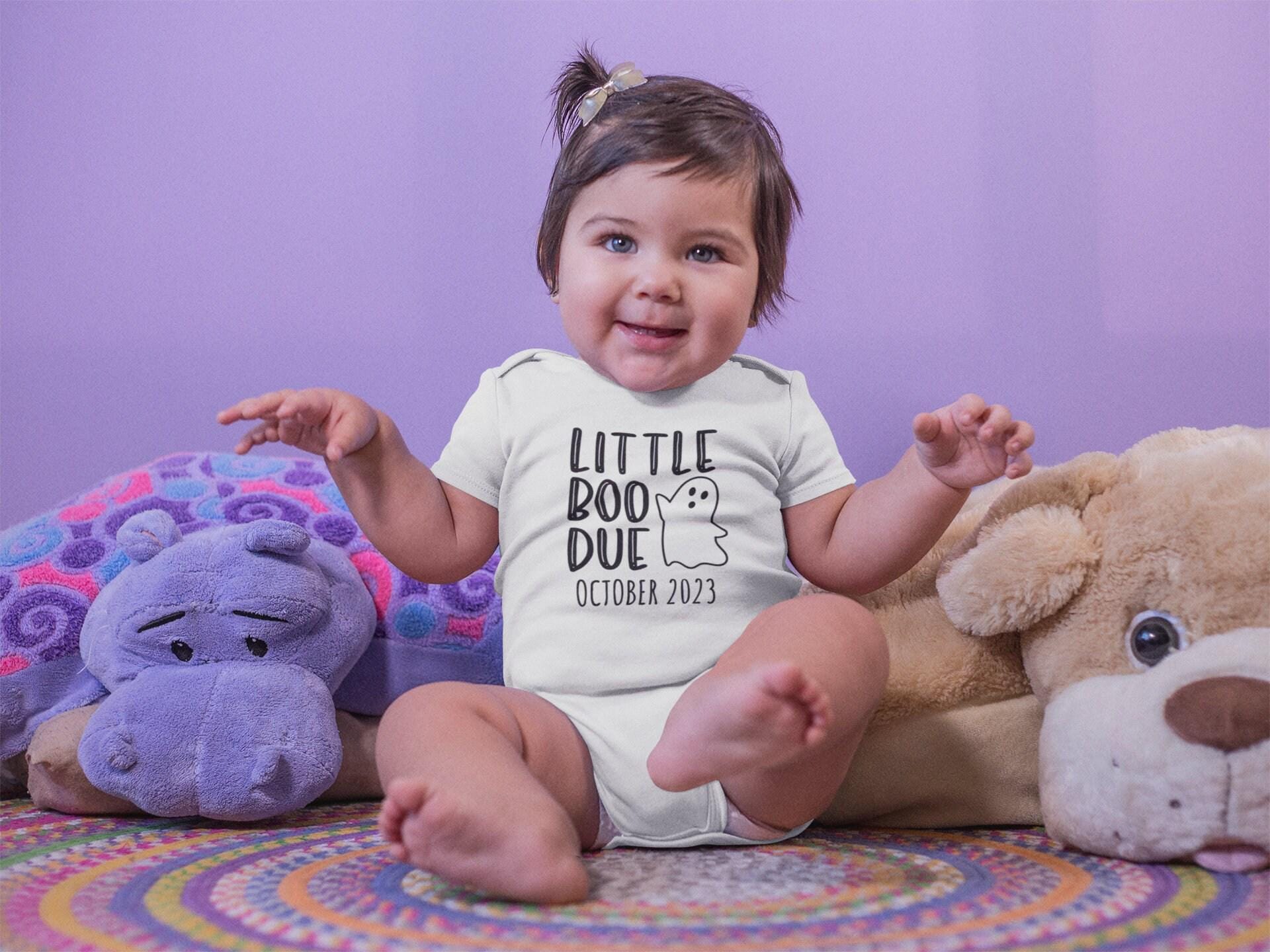 Lifestyle mockup featuring Personalized Halloween Pregnancy Announcement Onesie®