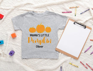 Lifestyle mockup featuring Mama's Little Pumpkin Fall Toddler Shirt