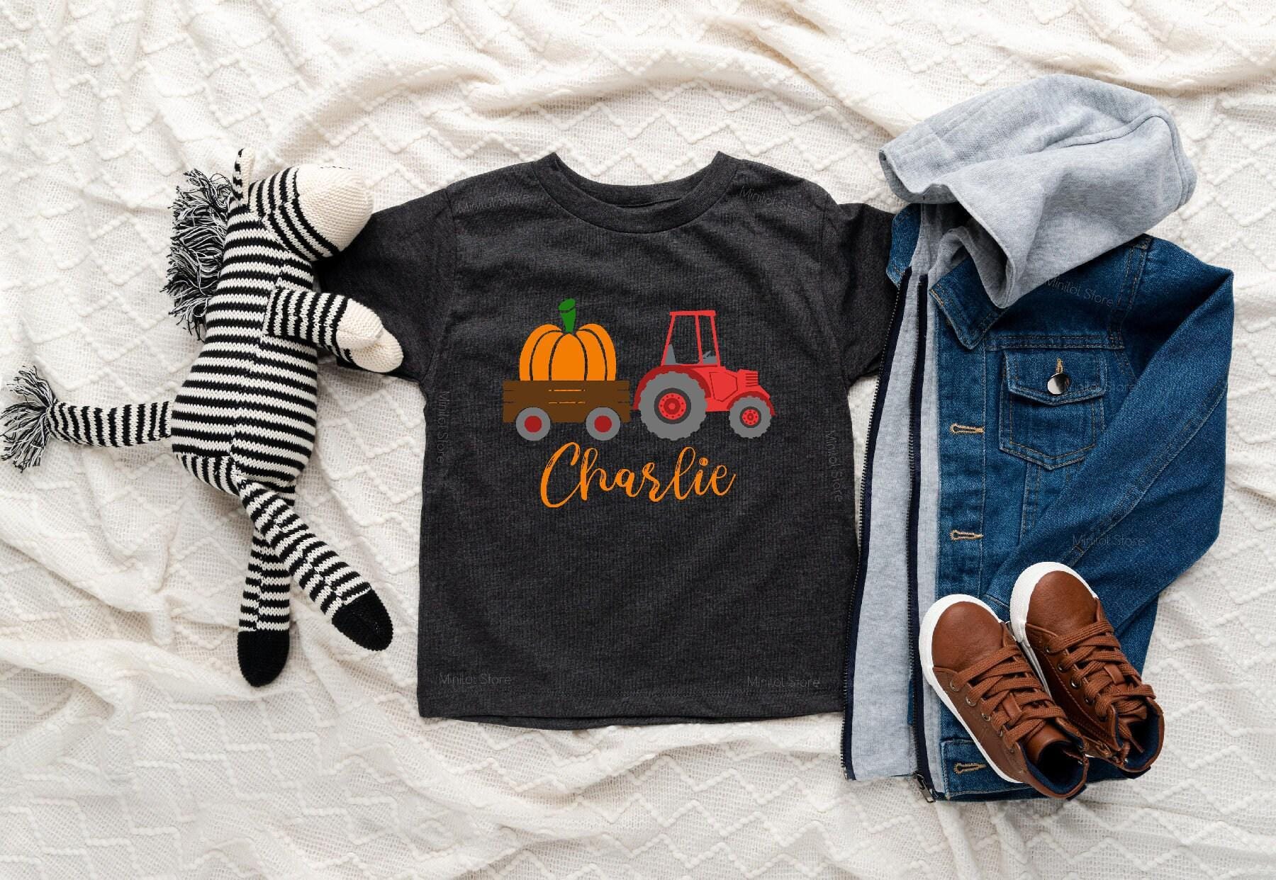 Lifestyle mockup featuring Personalized Farm Tractor Halloween Baby Onesie®