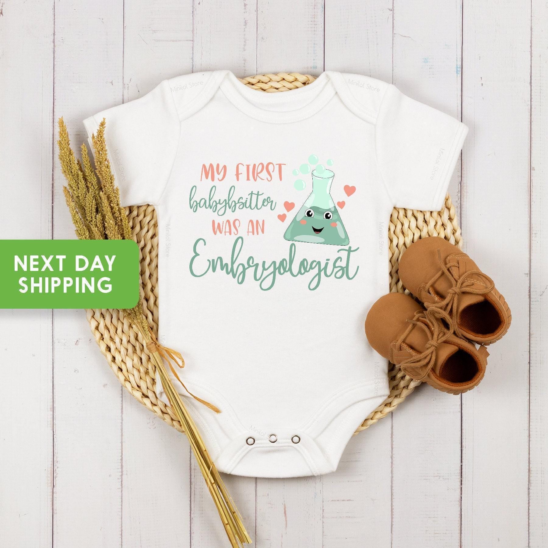 Main pregnancy announcement product mockup for My First Babysitter was an Embryologist Unisex IVF Baby Announcement Baby