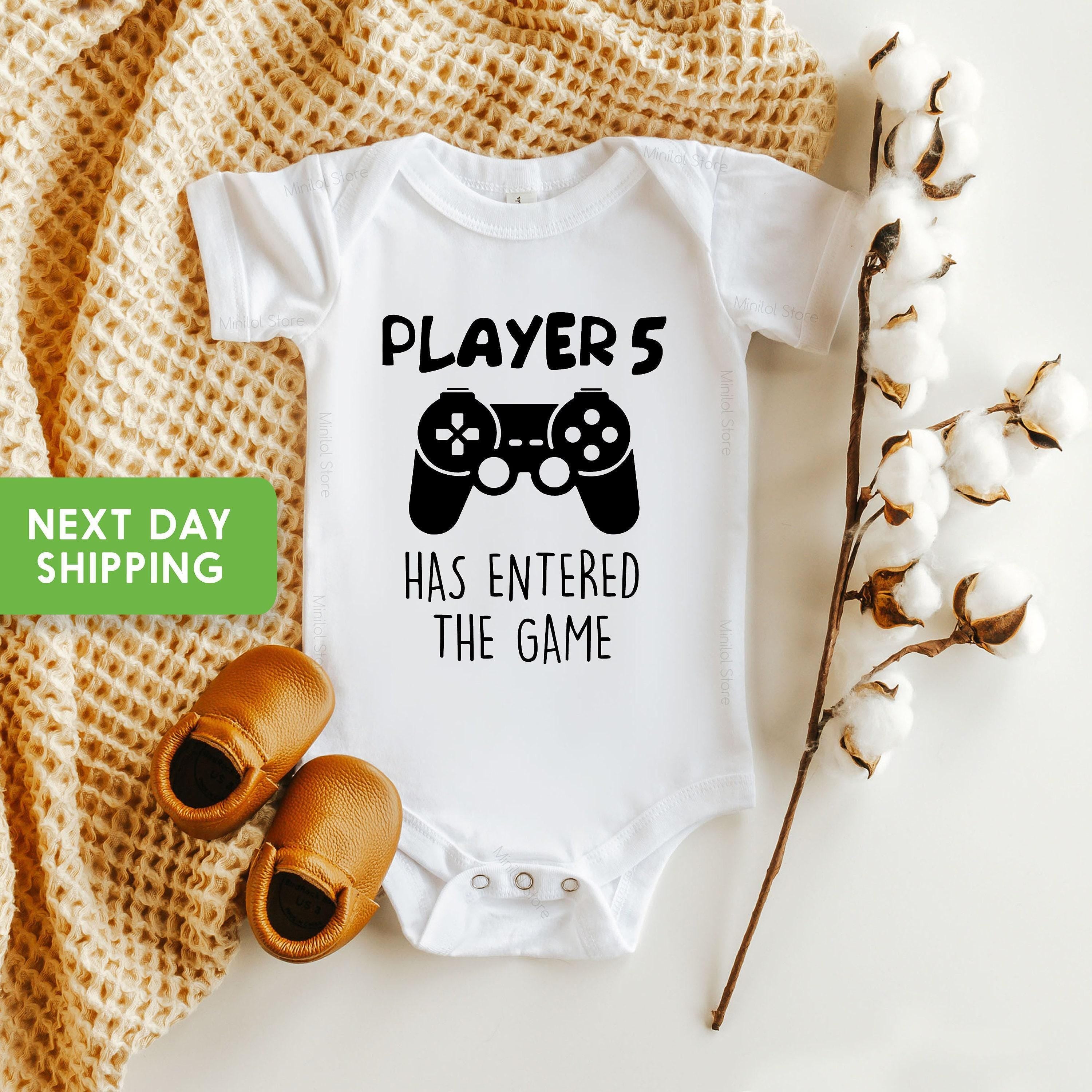 Close-up of the Player 5 Has Entered the Game baby announcement design