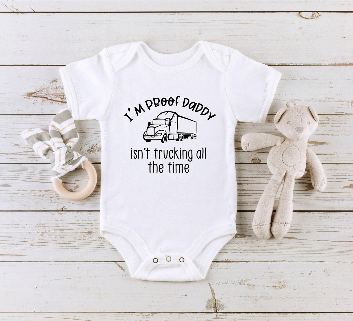Proof Daddy Isn't Trucking All the Time typographic design on Baby Short Sleeve Onesie®