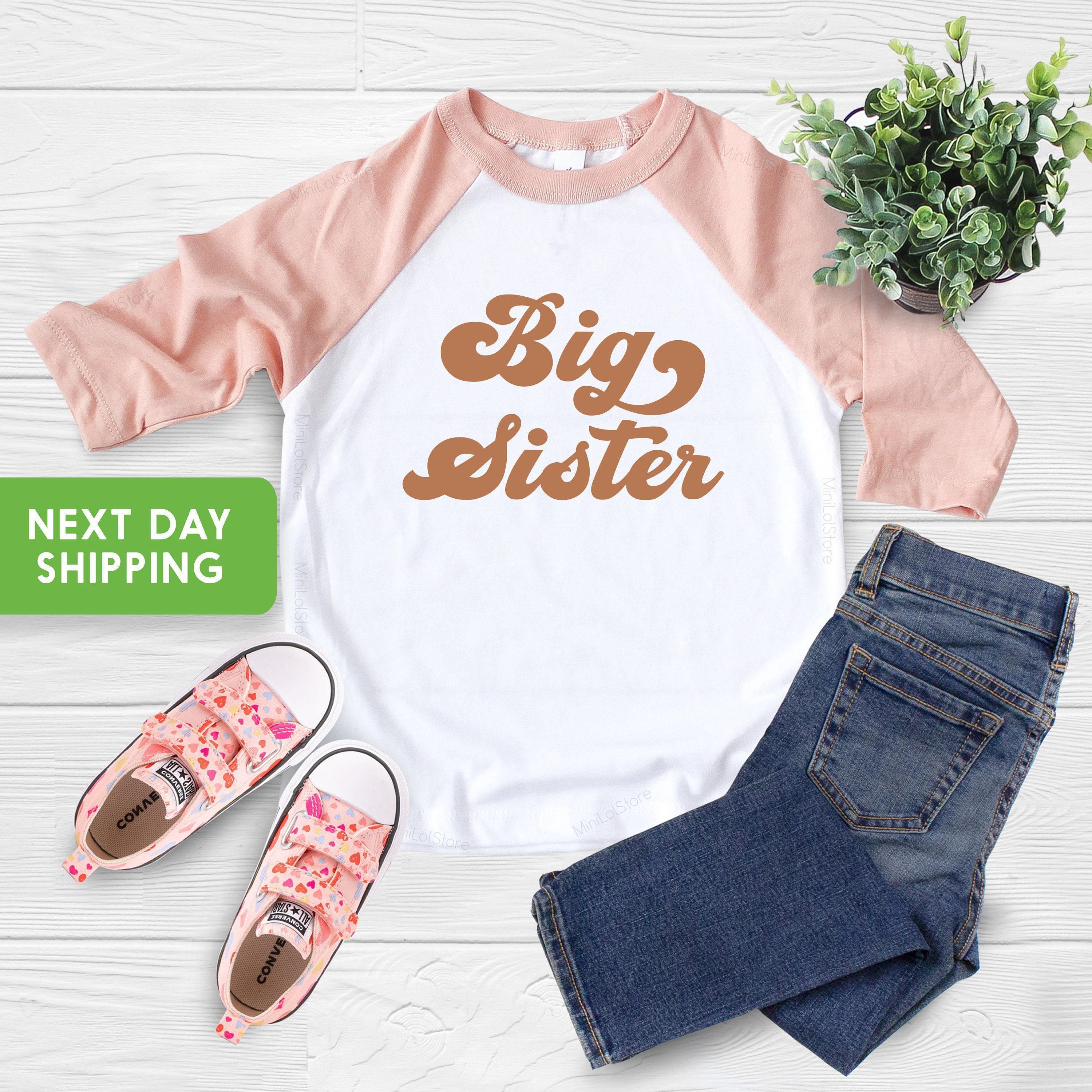 Main pregnancy announcement product mockup for Big Sister Pregnancy Announcement Sibling Reveal Shirt – Style 4