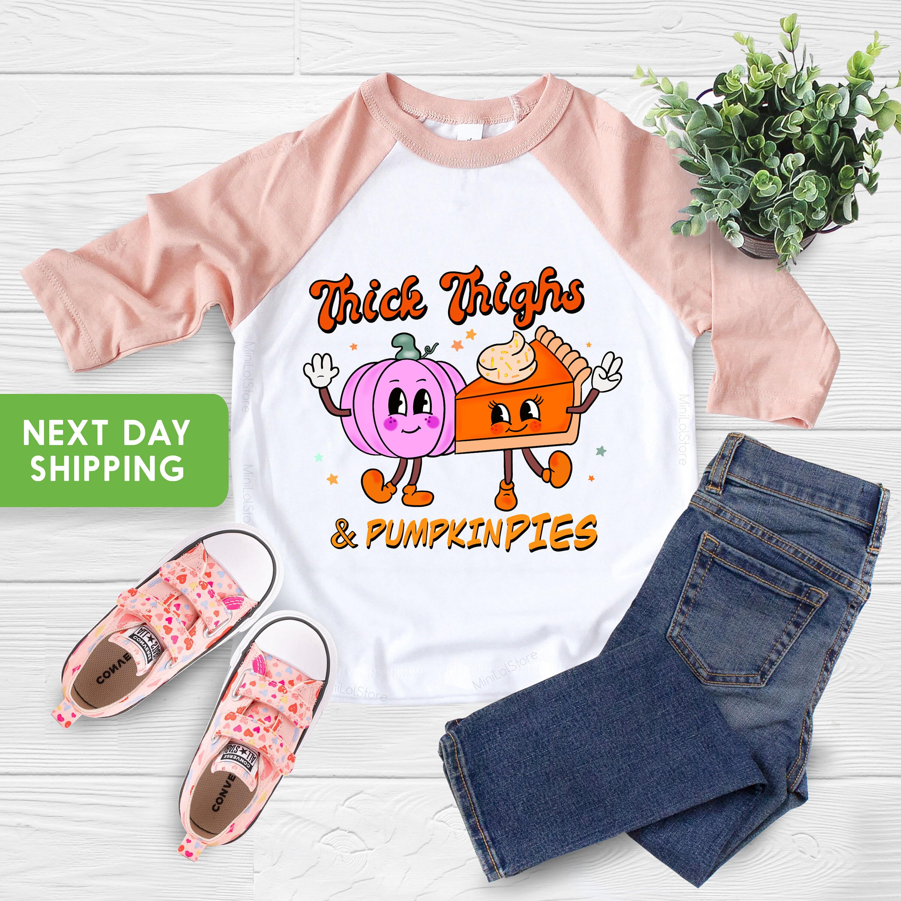 Close-up of the Thick Thighs & Pumpkin Pies Thanksgiving apparel design