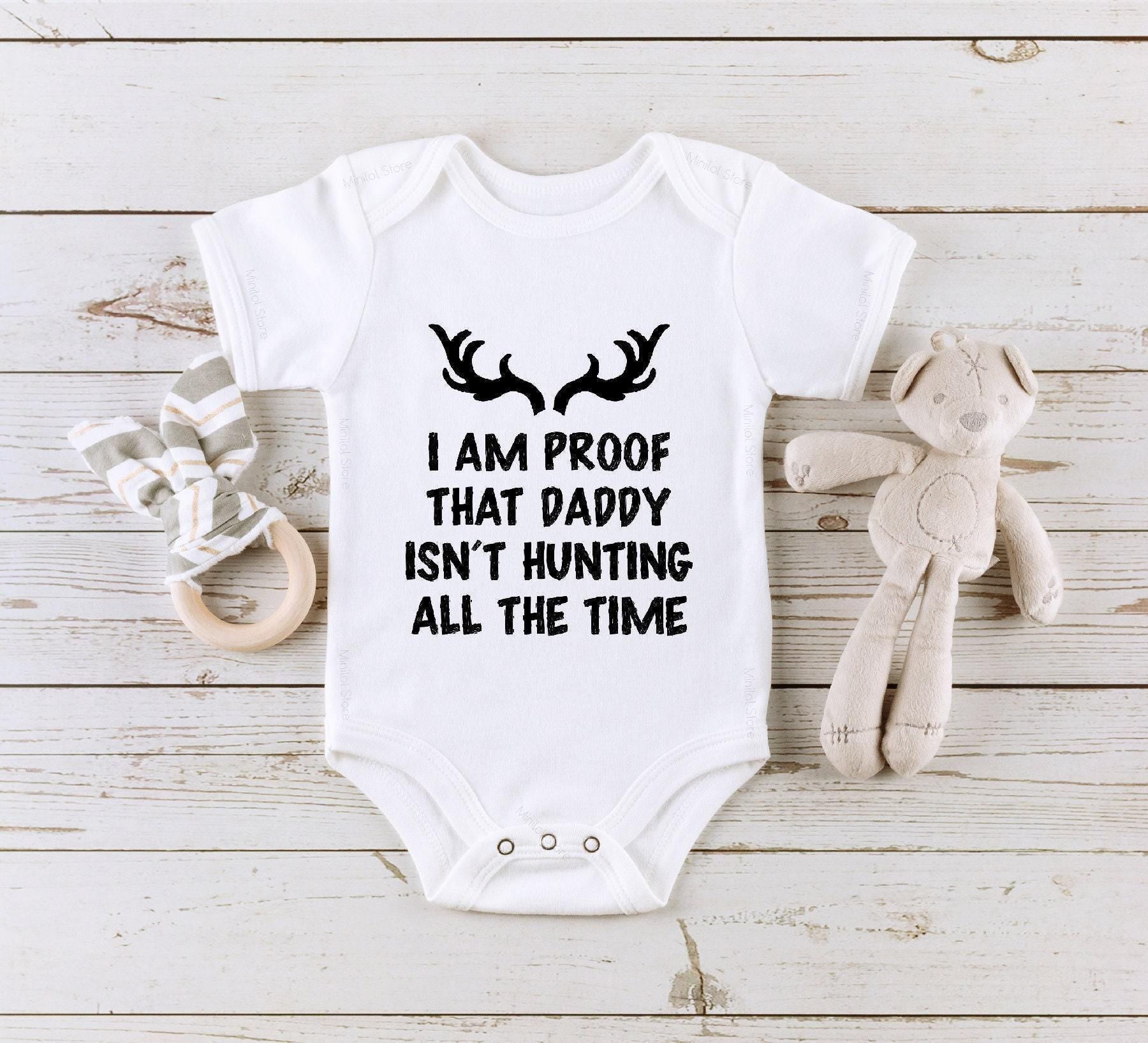 Close-up of the Proof Daddy Doesn't Hunt All the Time baby announcement design