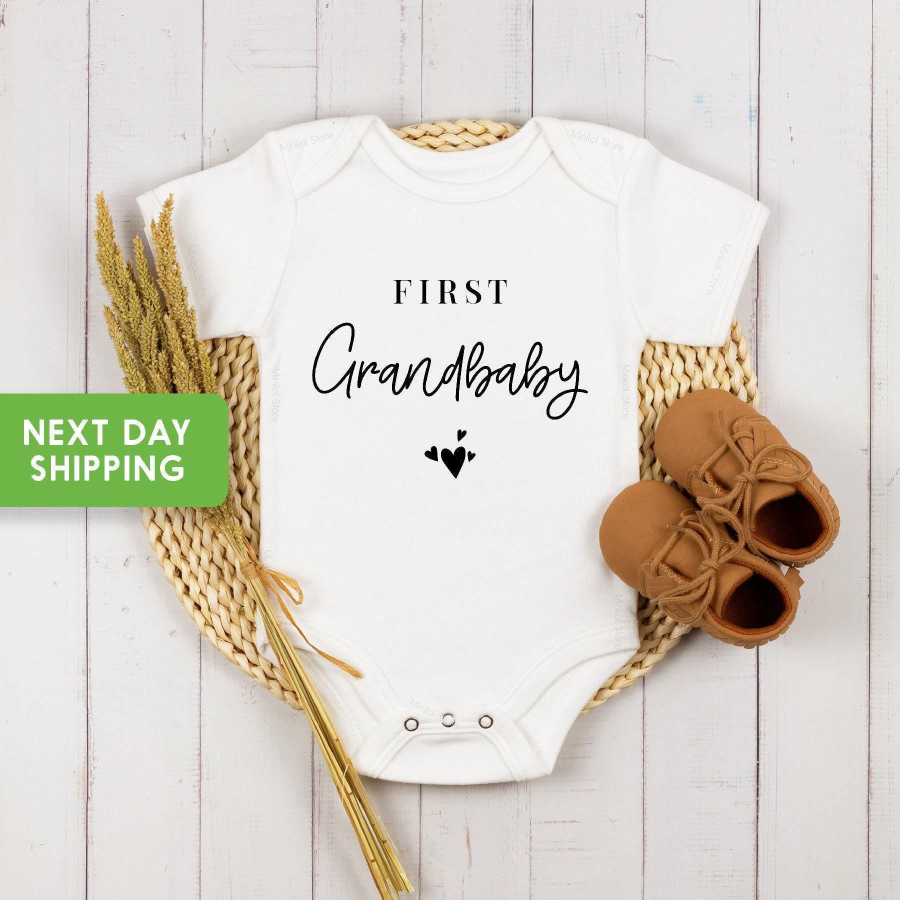 Close-up of the First Grandchild baby announcement design