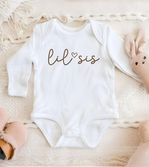 Big and Little Sis Matching typographic design on Baby Short Sleeve Onesie®
