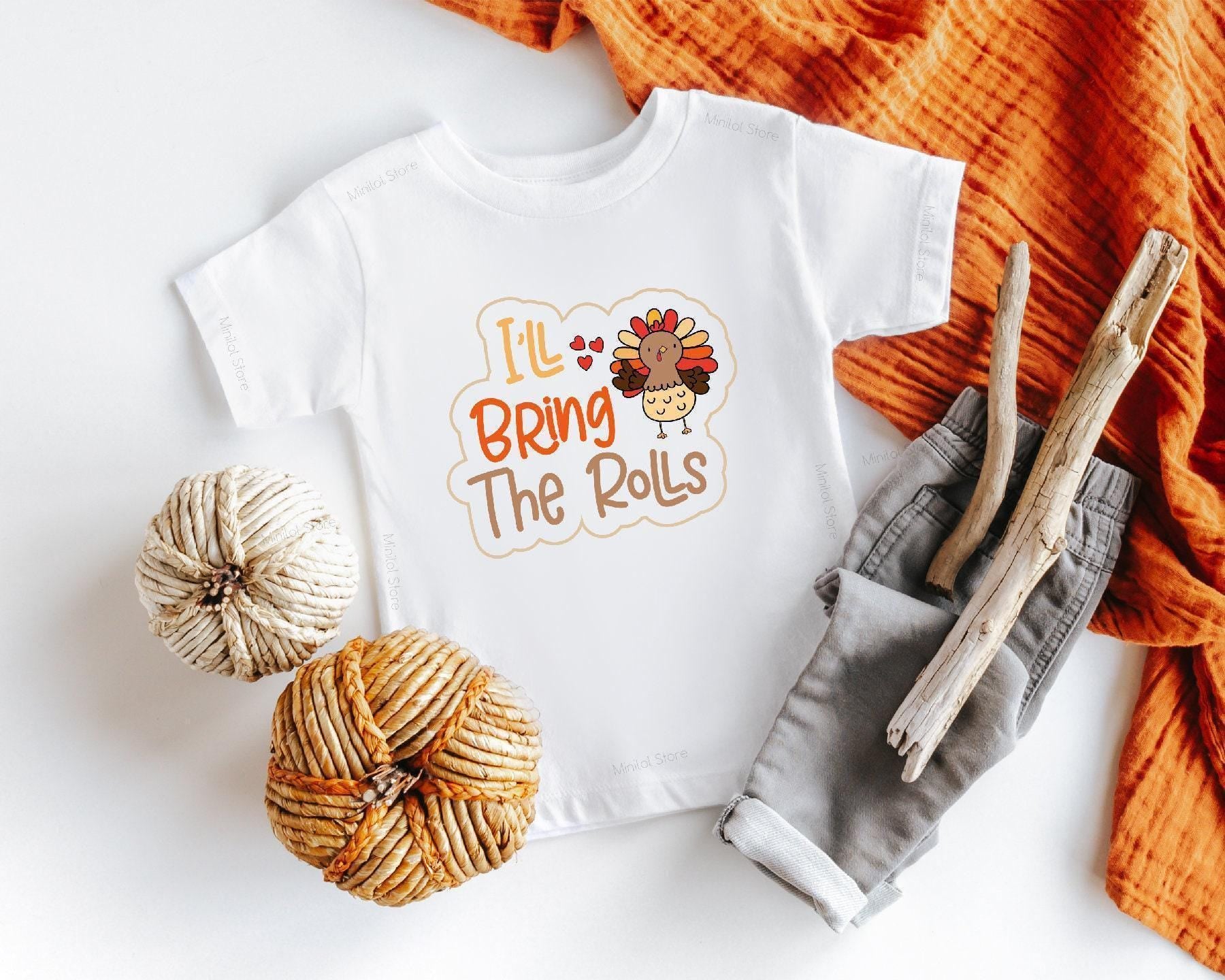 Close-up of the I'll Bring the Rolls Thanksgiving apparel design