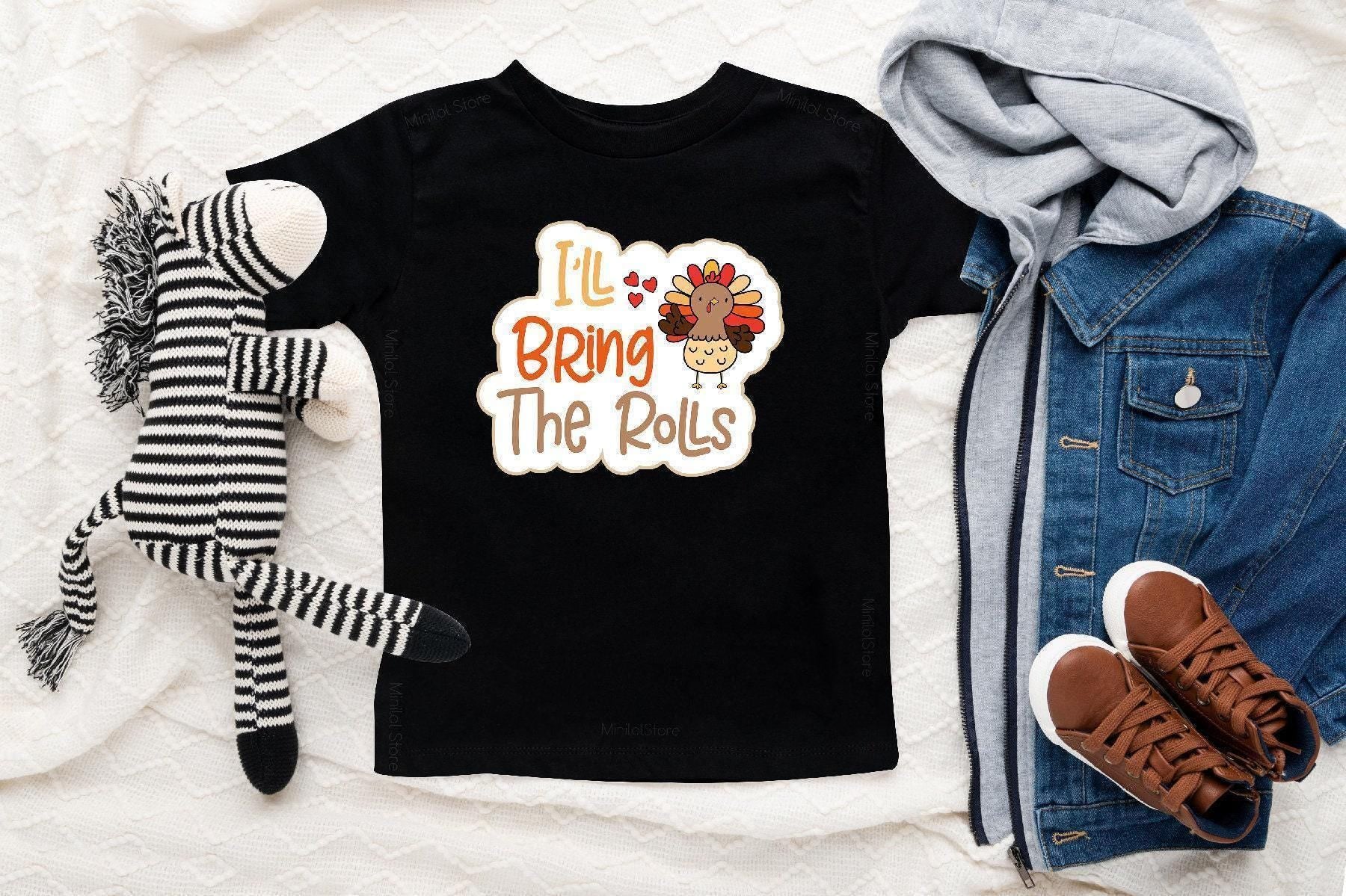 Lifestyle mockup featuring I'll Bring the Rolls Thanksgiving Baby Onesie® – Style 2