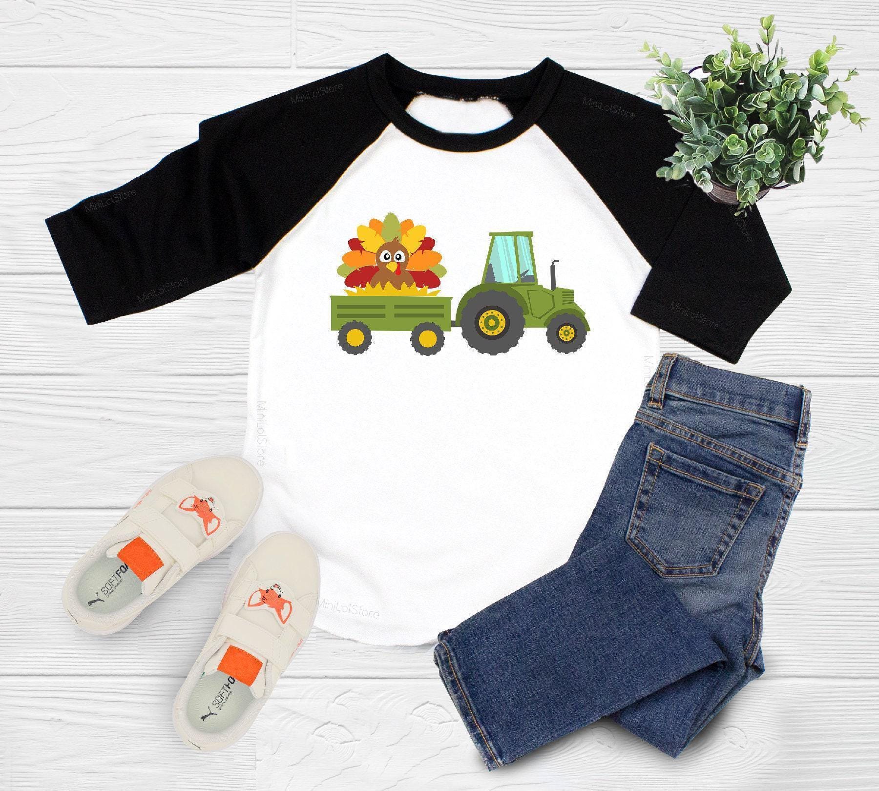 Main product mockup of Turkey Tractor Thanksgiving Toddler Shirt