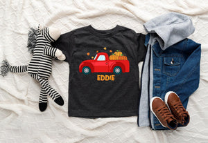 Lifestyle mockup featuring Personalized Fall Red Truck Kids Shirt