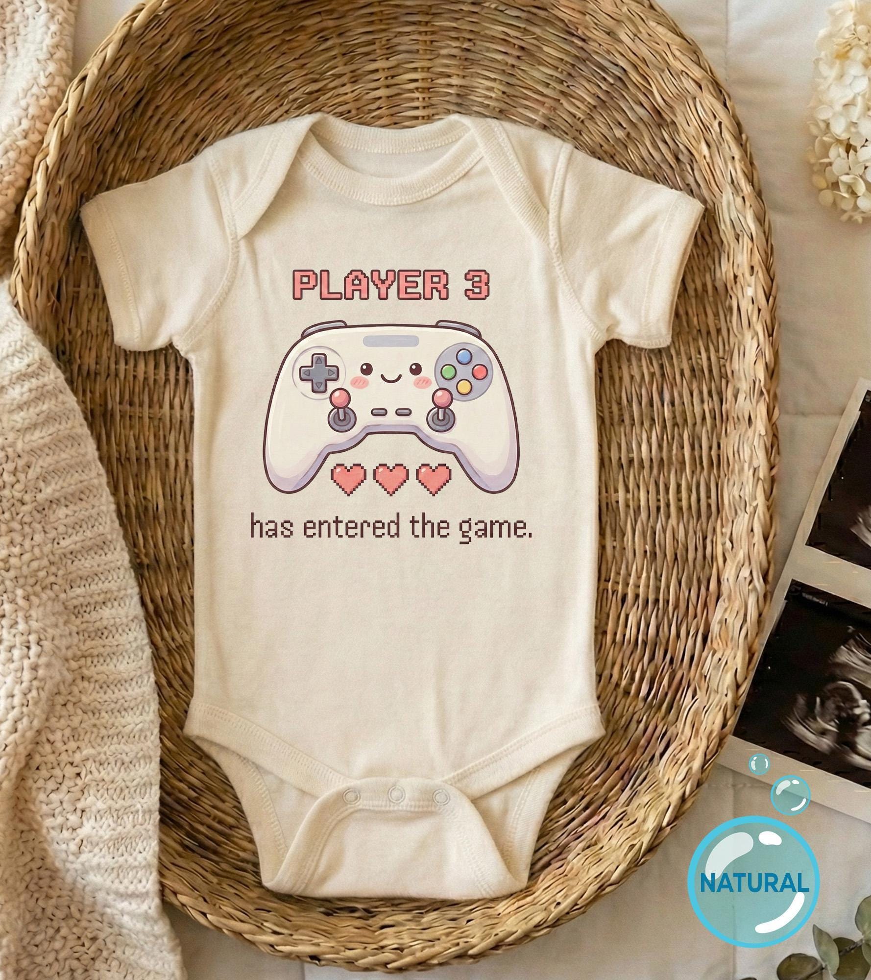 Close-up of the Player 3 Has Entered the Game baby announcement design