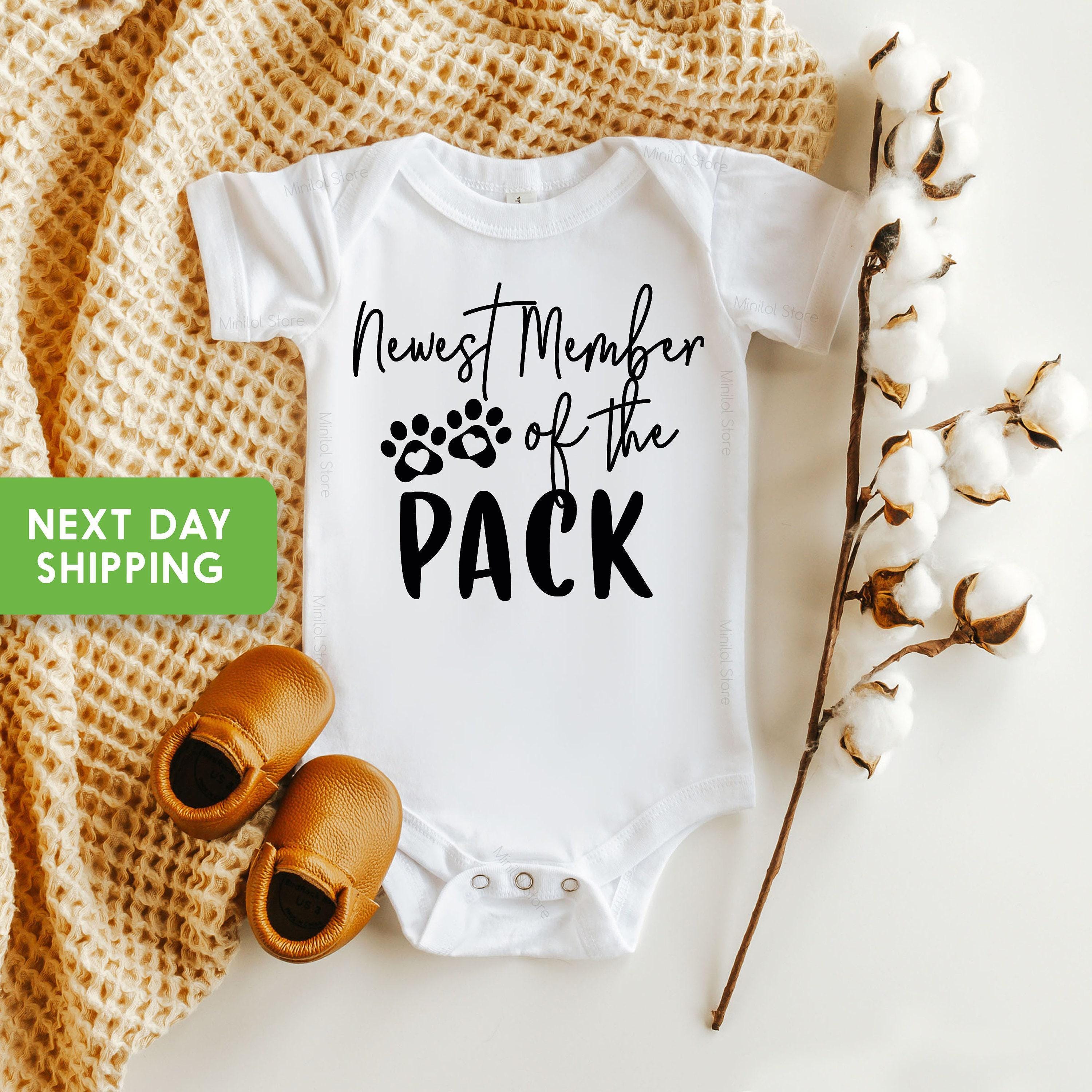 Main pregnancy announcement product mockup for Newest Member of the Pack Pet Pregnancy Announcement Baby Announcement Onesie®