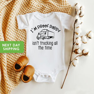 Proof Daddy Isn't Trucking All the Time typographic design on Baby Short Sleeve Onesie®