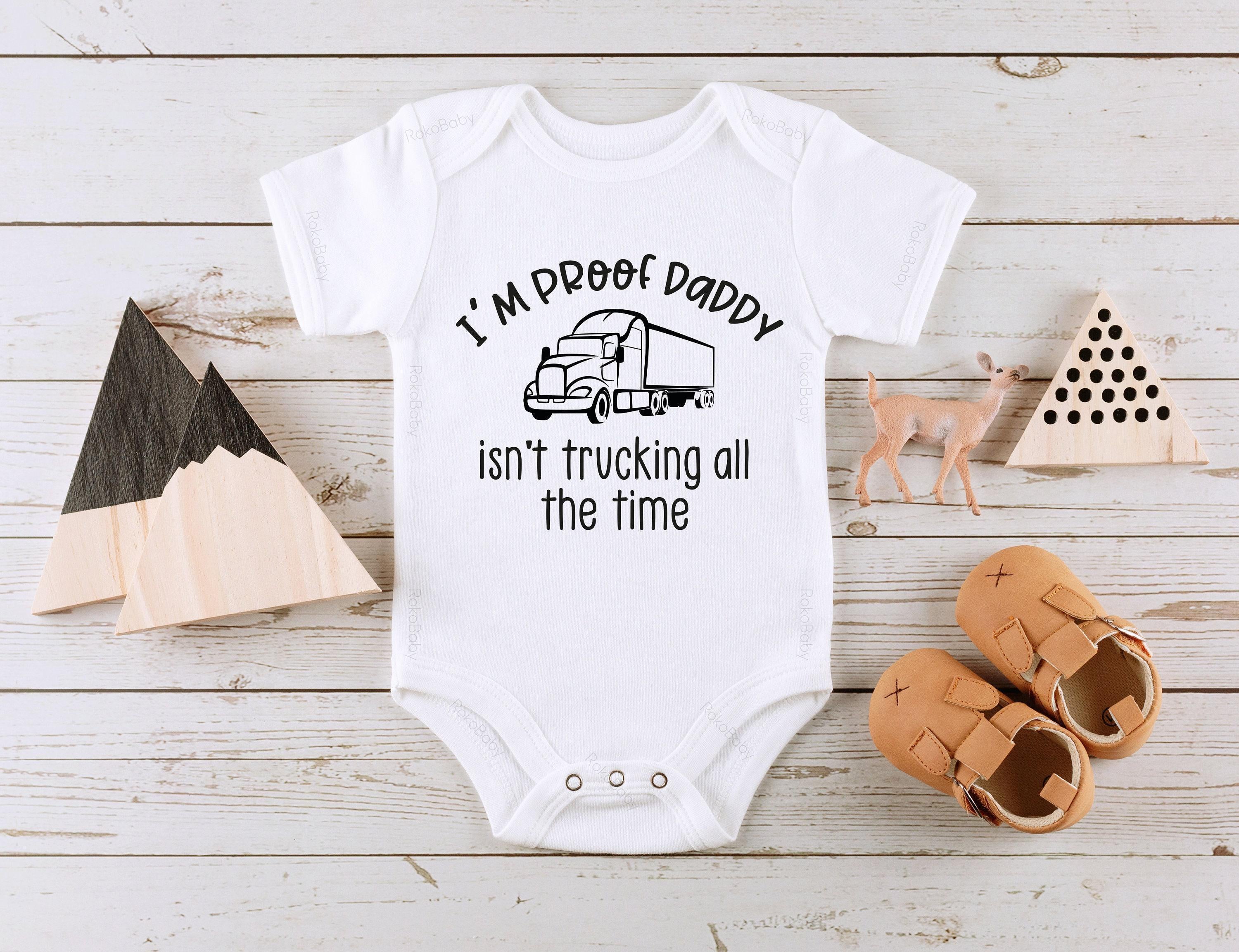 Close-up of the Proof Daddy Isn't Trucking All the Time baby announcement design