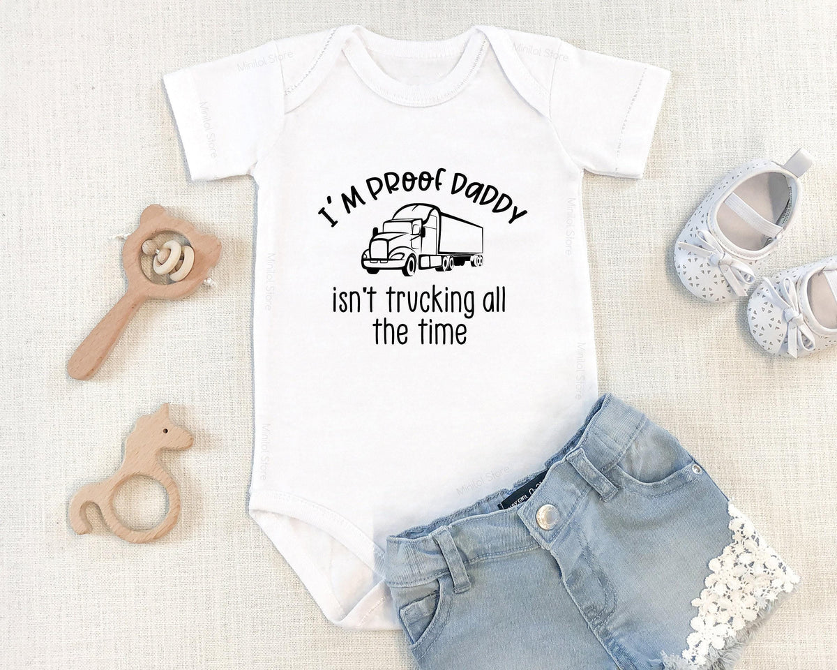 Proof Daddy Isn't Trucking All the Time typographic design on Baby Short Sleeve Onesie®