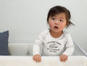 Proof Daddy Isn't Trucking All the Time typographic design on Baby Short Sleeve Onesie®