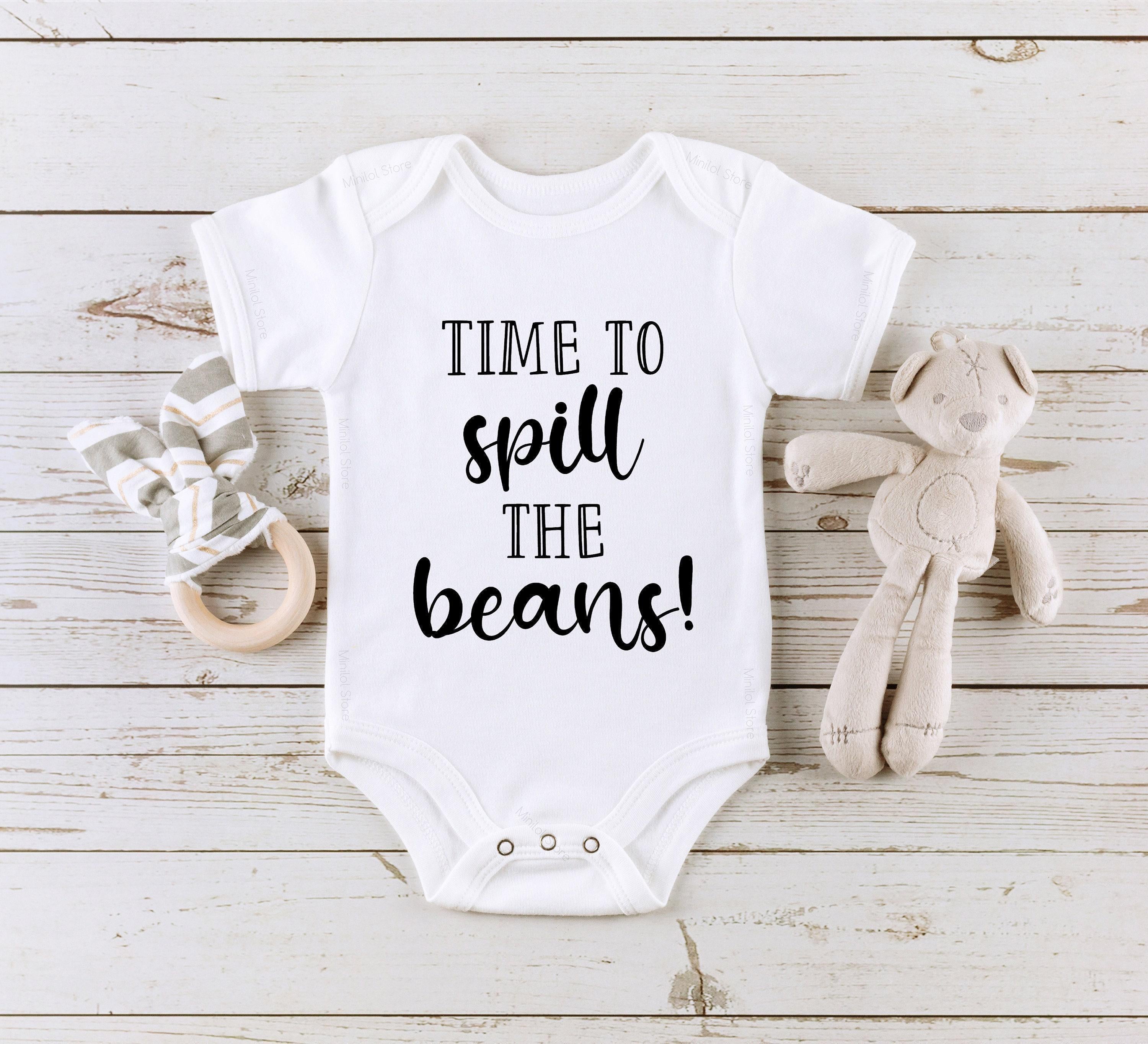 Close-up of the Spill the Beans baby announcement design