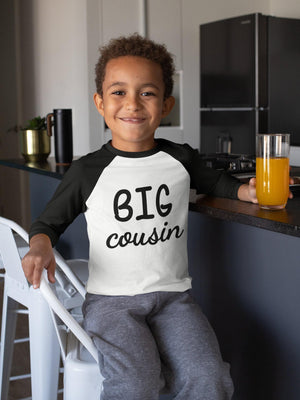 Pregnancy Announcement Cousin Reveal typographic design on Baby Short Sleeve Onesie®