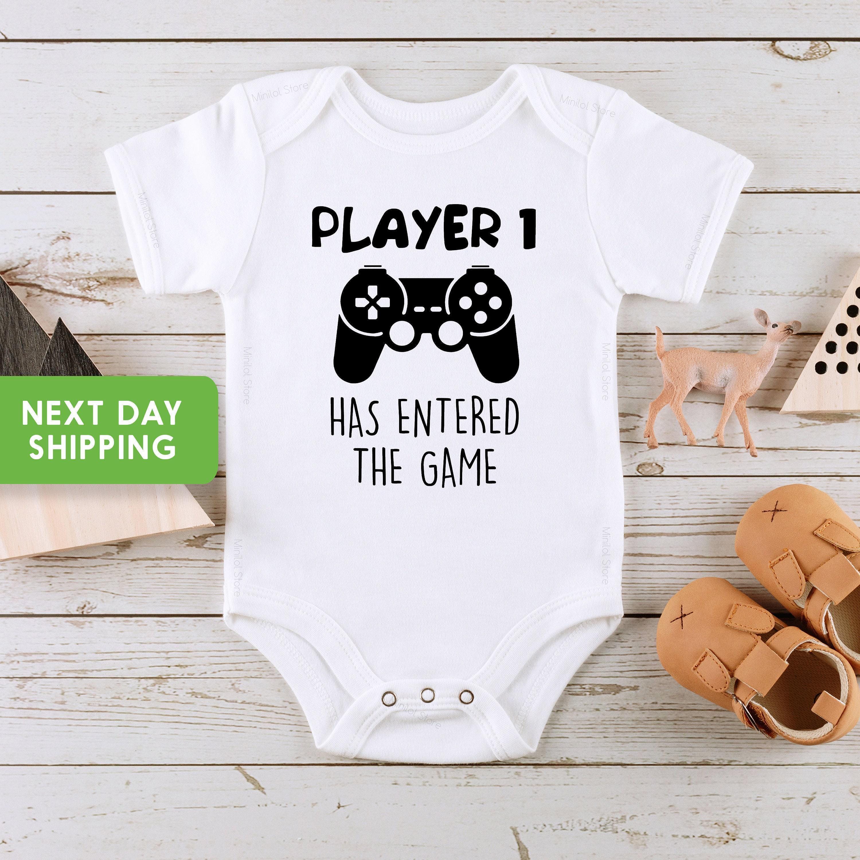 Close-up of the Player 1 Has Entered the Game baby announcement design