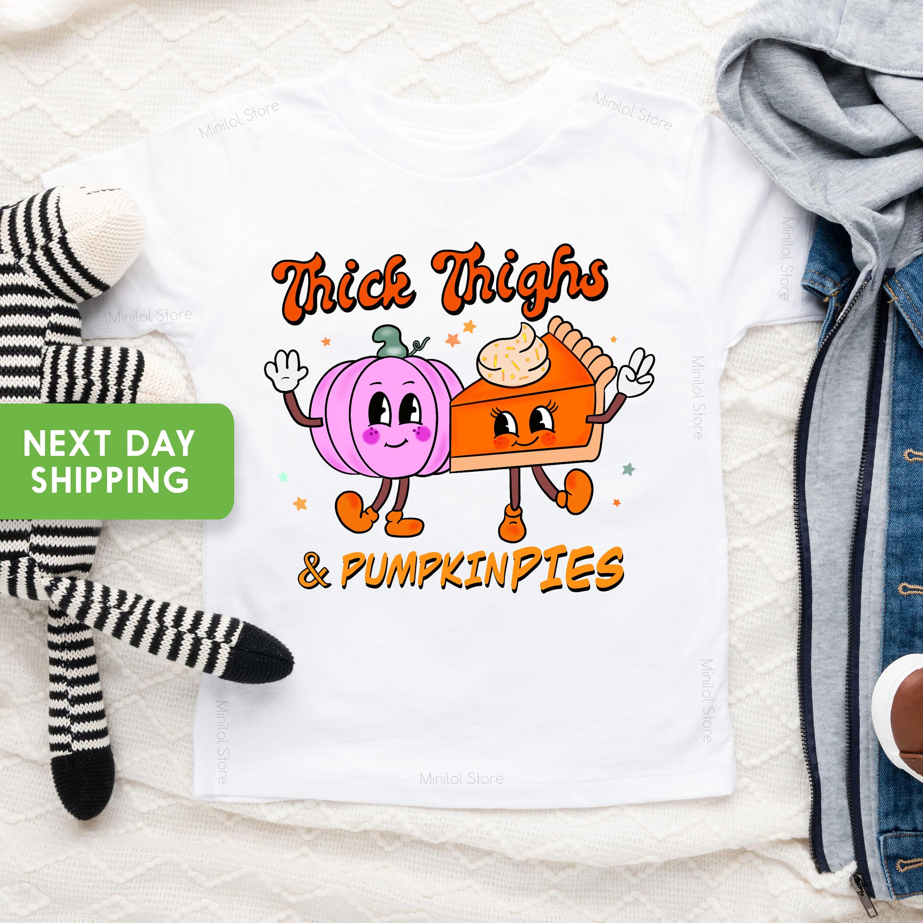 Lifestyle mockup featuring Thick Thighs & Pumpkin Pies Thanksgiving Baby Onesie®