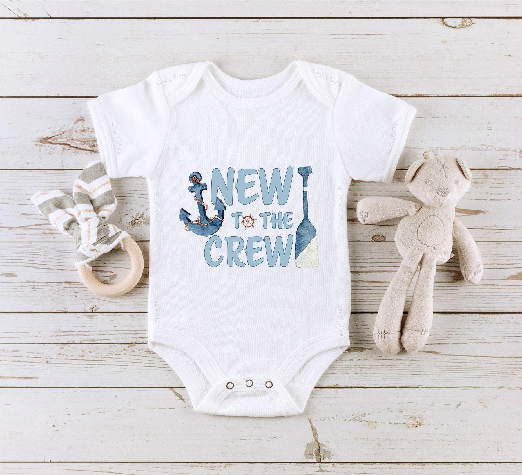 Main pregnancy announcement product mockup for New to the Crew Pregnancy Announcement Baby Announcement Onesie® – Style 2