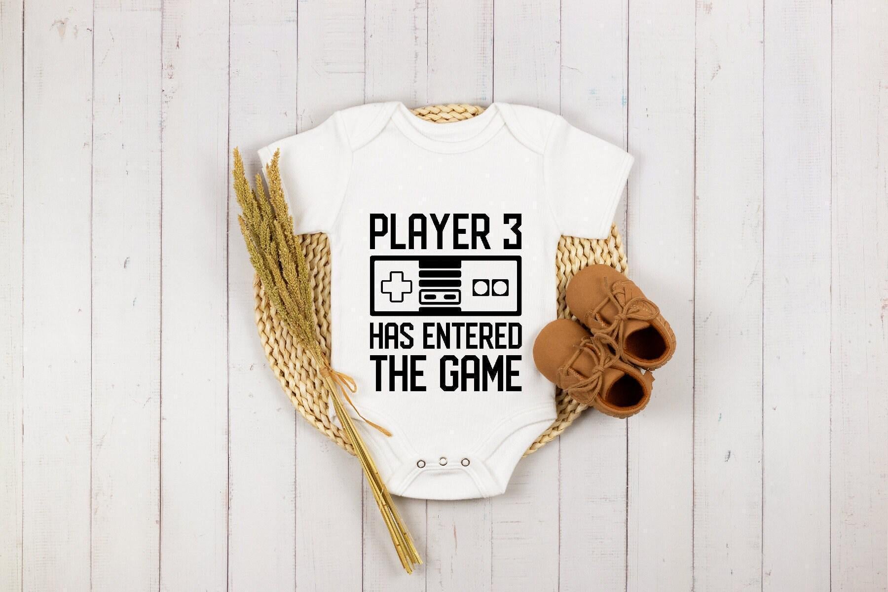 Close-up of the Player 3 Has Entered the Game baby announcement design