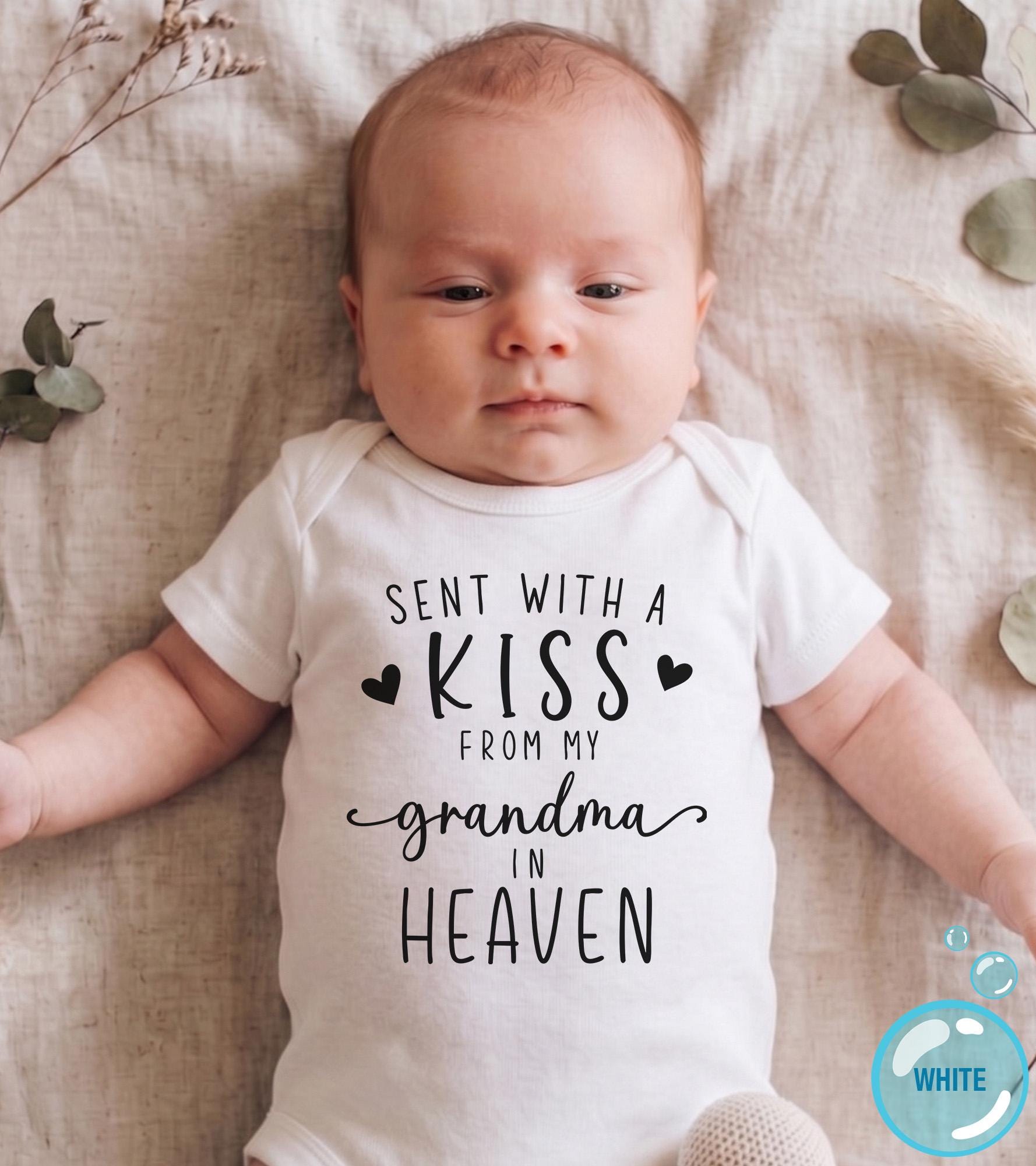Close-up of the Sent With A Kiss From My Grandma baby announcement design