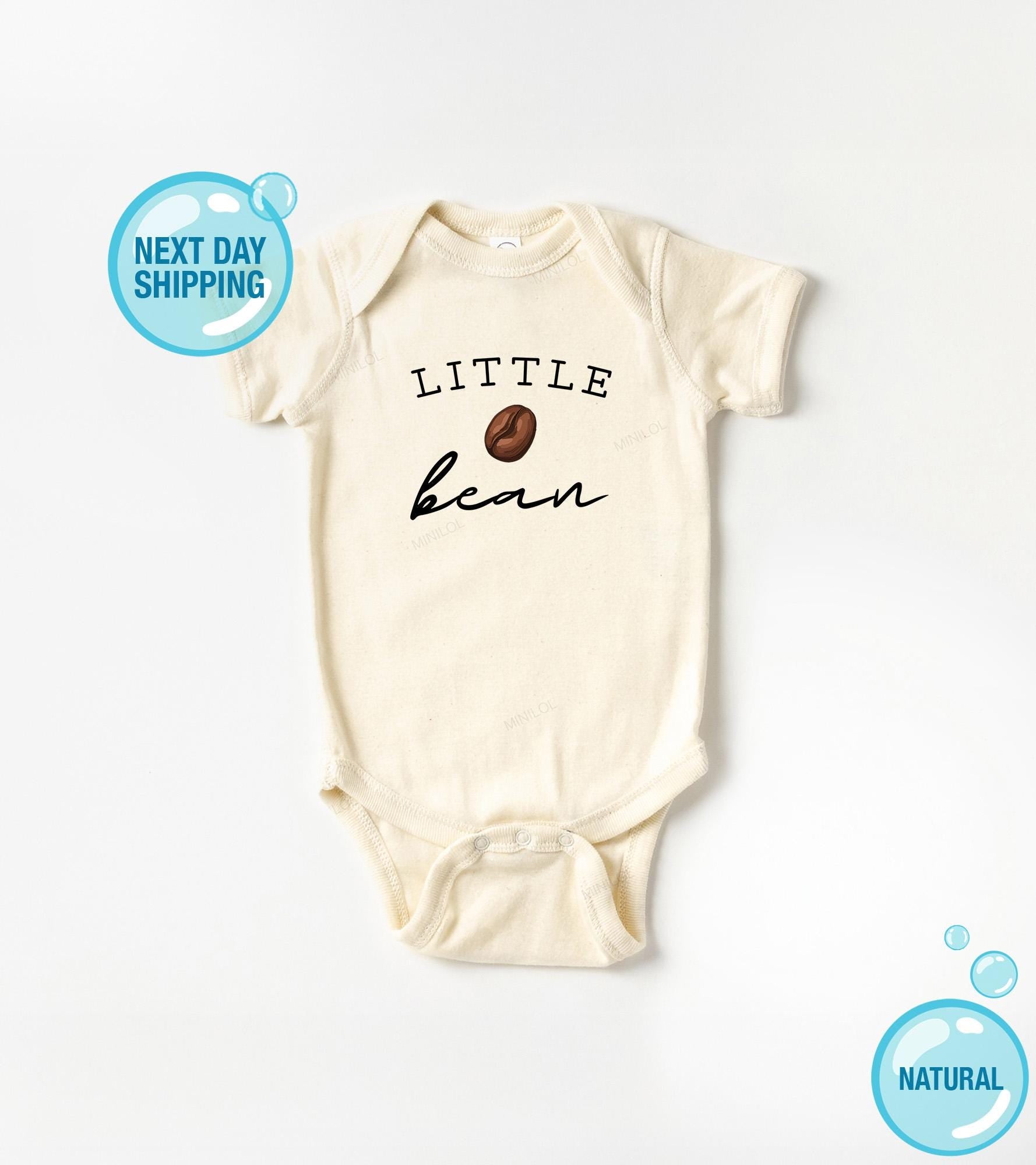 Main pregnancy announcement product mockup for Little Bean Pregnancy Announcement Baby Announcement Onesie®
