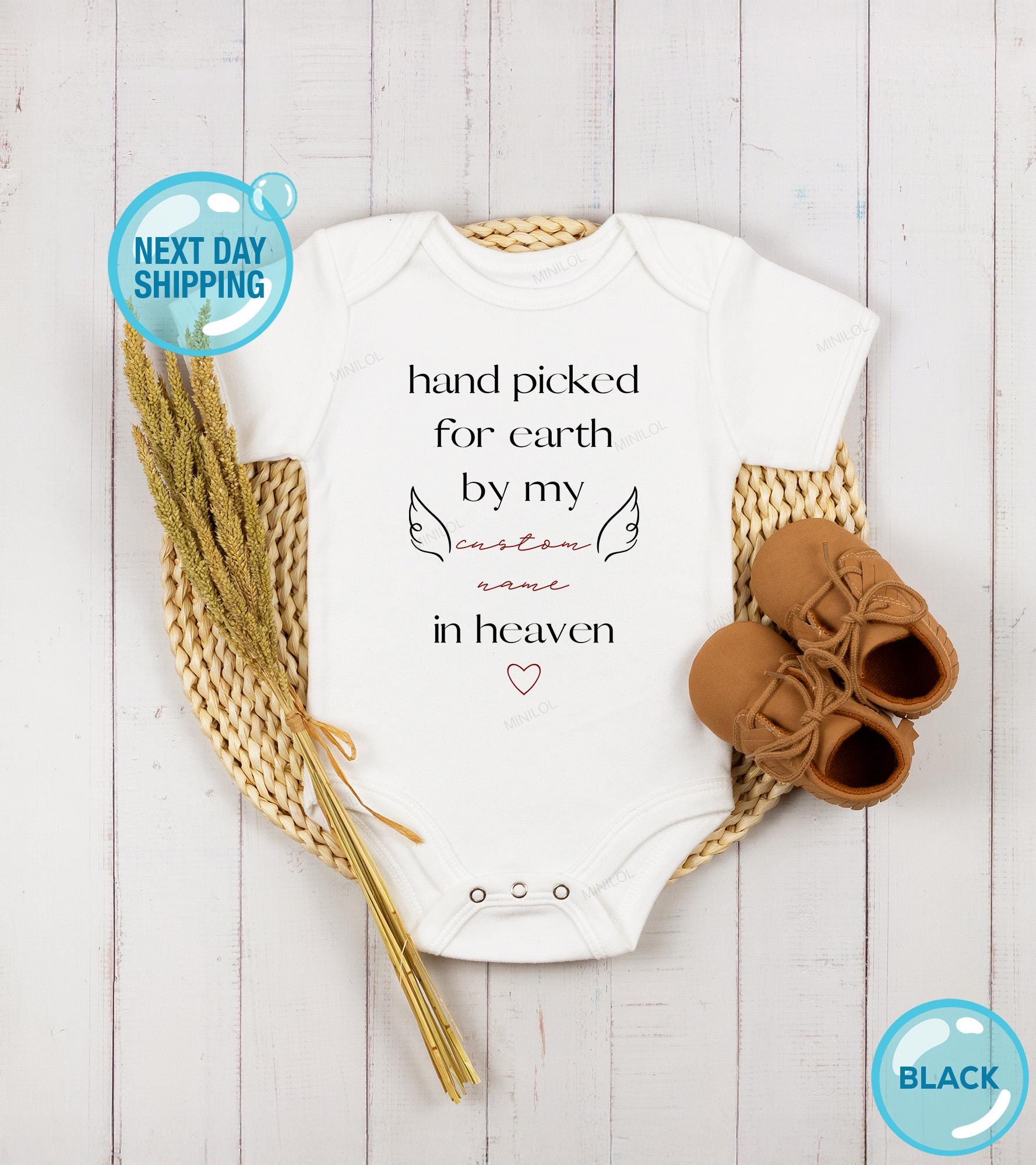 Main pregnancy announcement product mockup for Handpicked for Earth Rainbow Baby Announcement Baby Announcement Onesie®